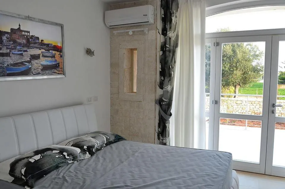 Bed in Dimora Porto Contessa