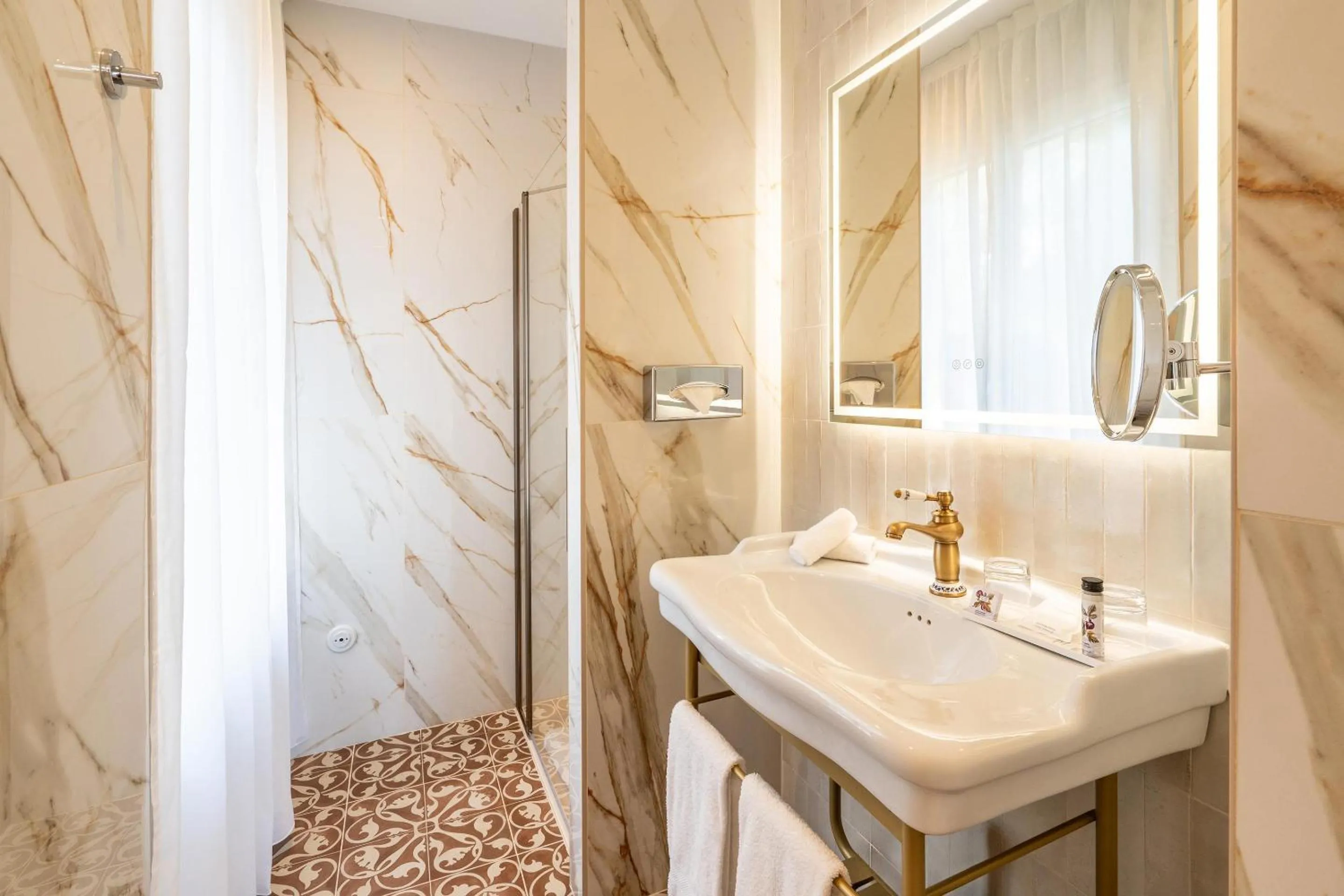 Bathroom in Grand Hotel Des Lecques; BW Signature Collection