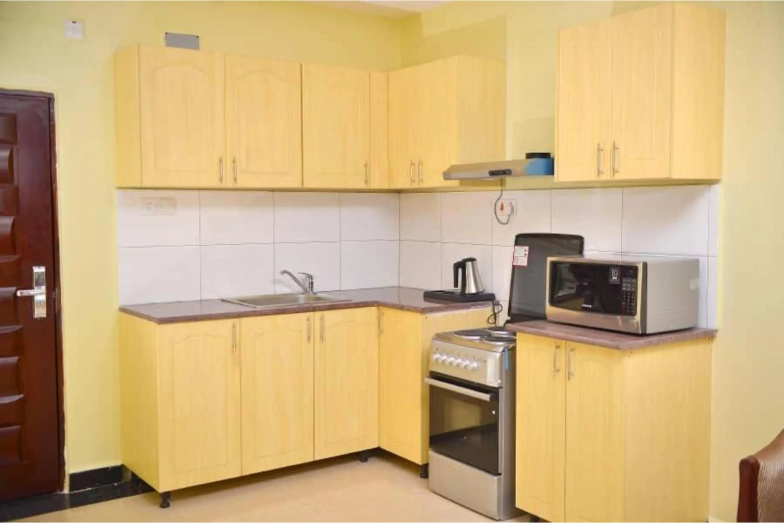 Kitchen or kitchenette in Crystal Suites & Apartments