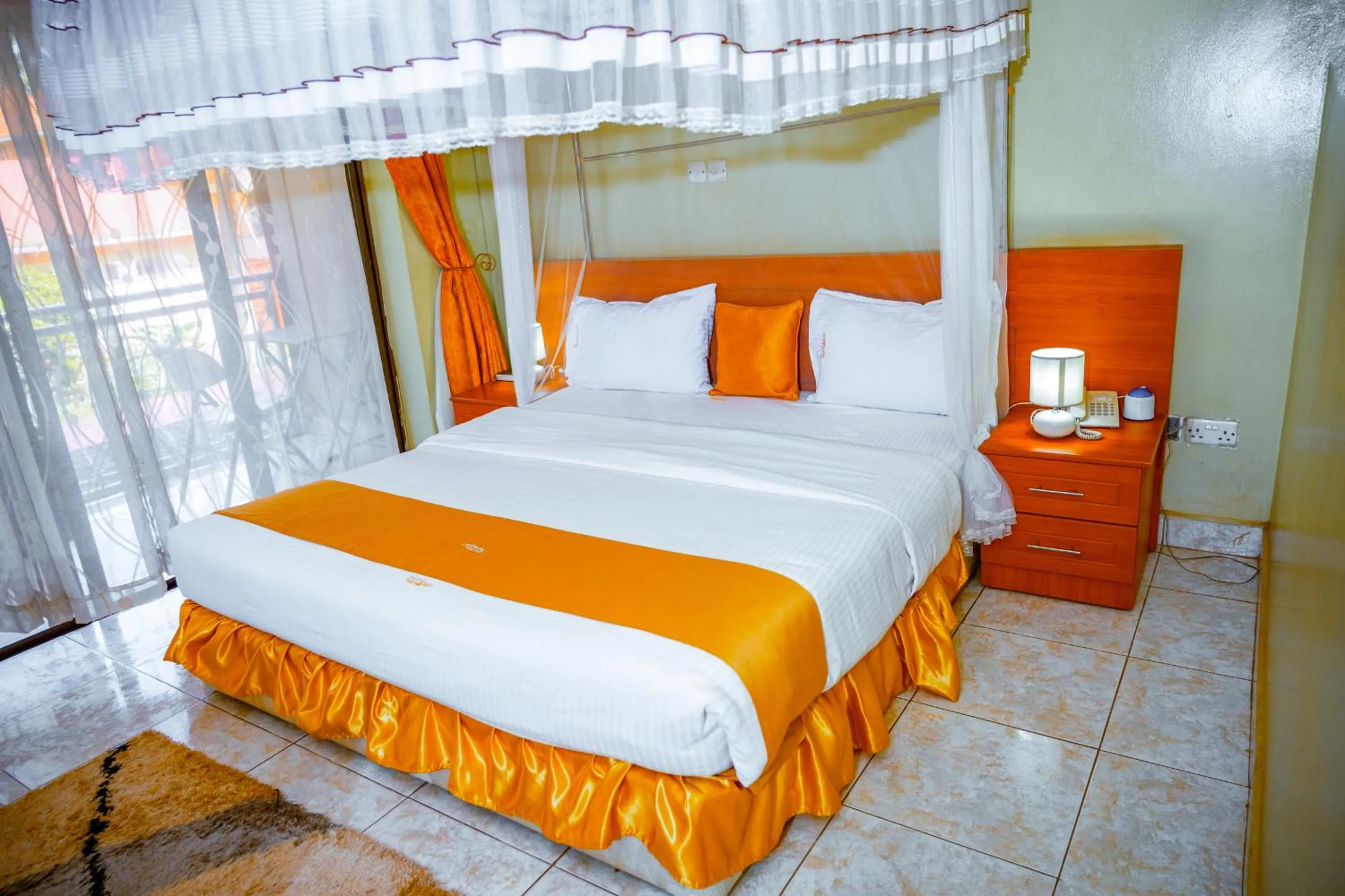 Bedroom, Bed in Crystal Suites & Apartments