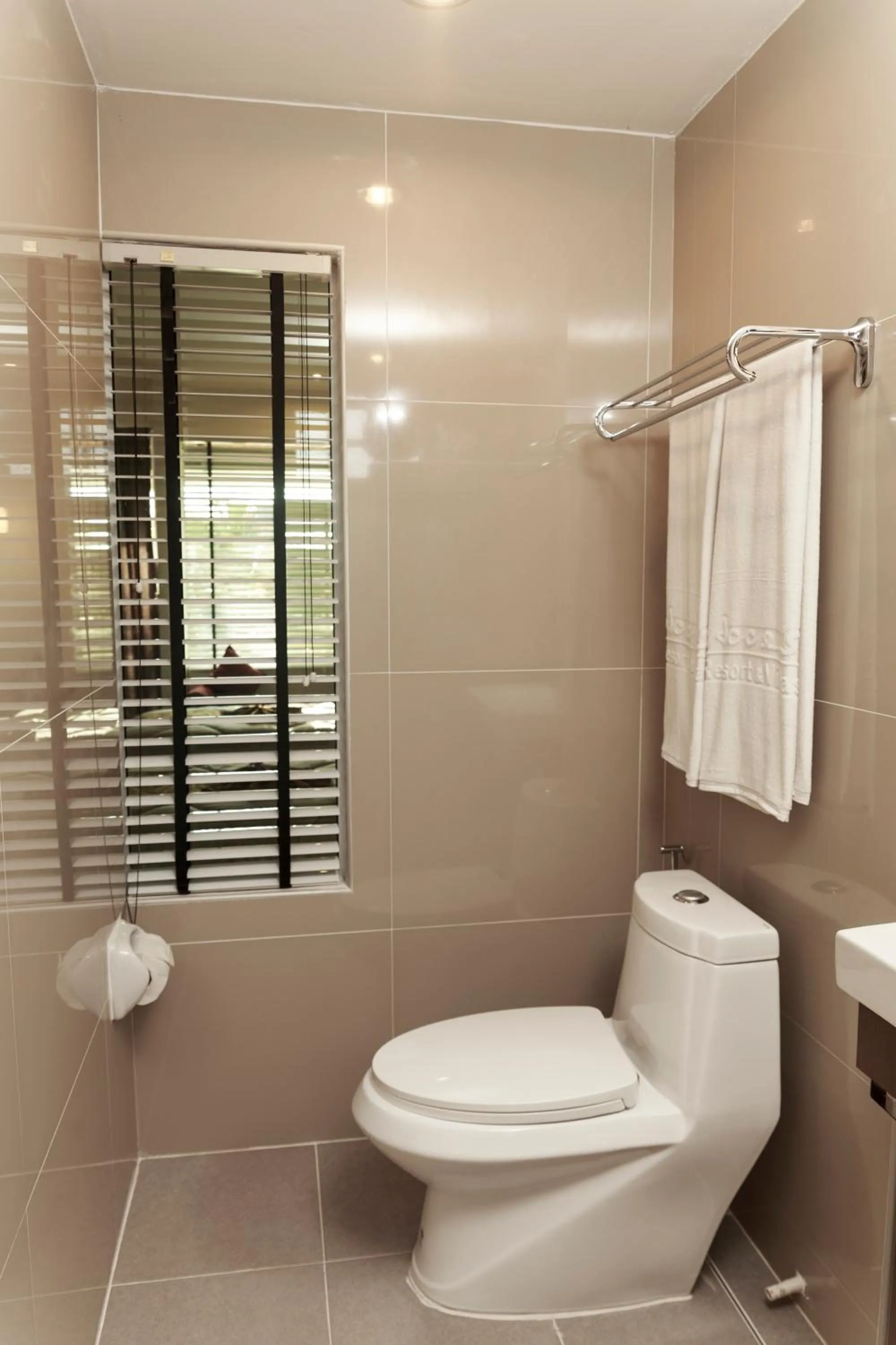 Toilet in Impress Resort