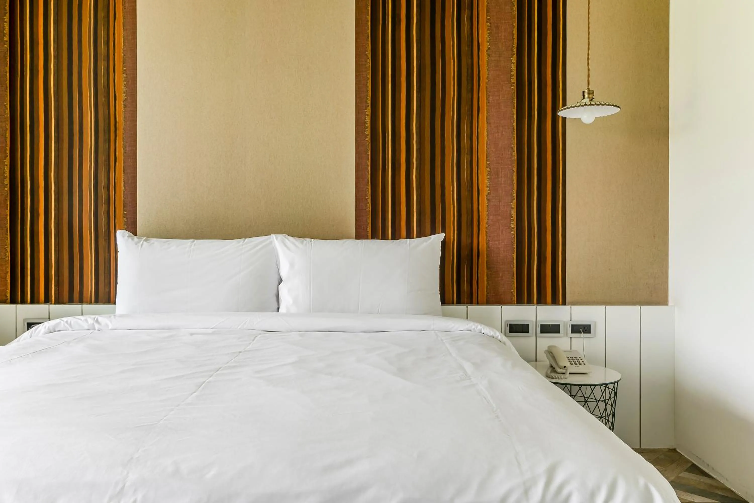 Bed in Han Yan Design Hotel