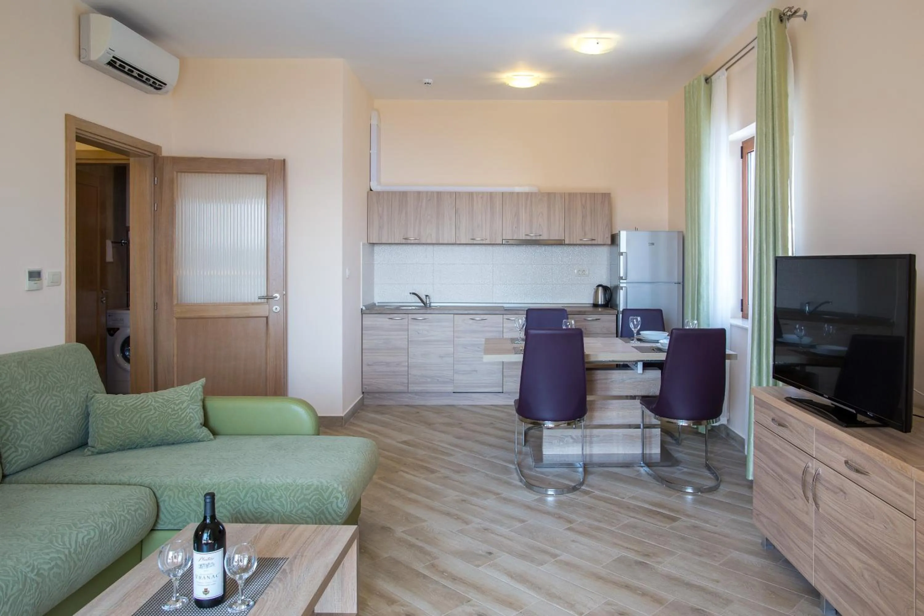 Kitchen or kitchenette in ApartHotel Belvedere Residence Becici Budva