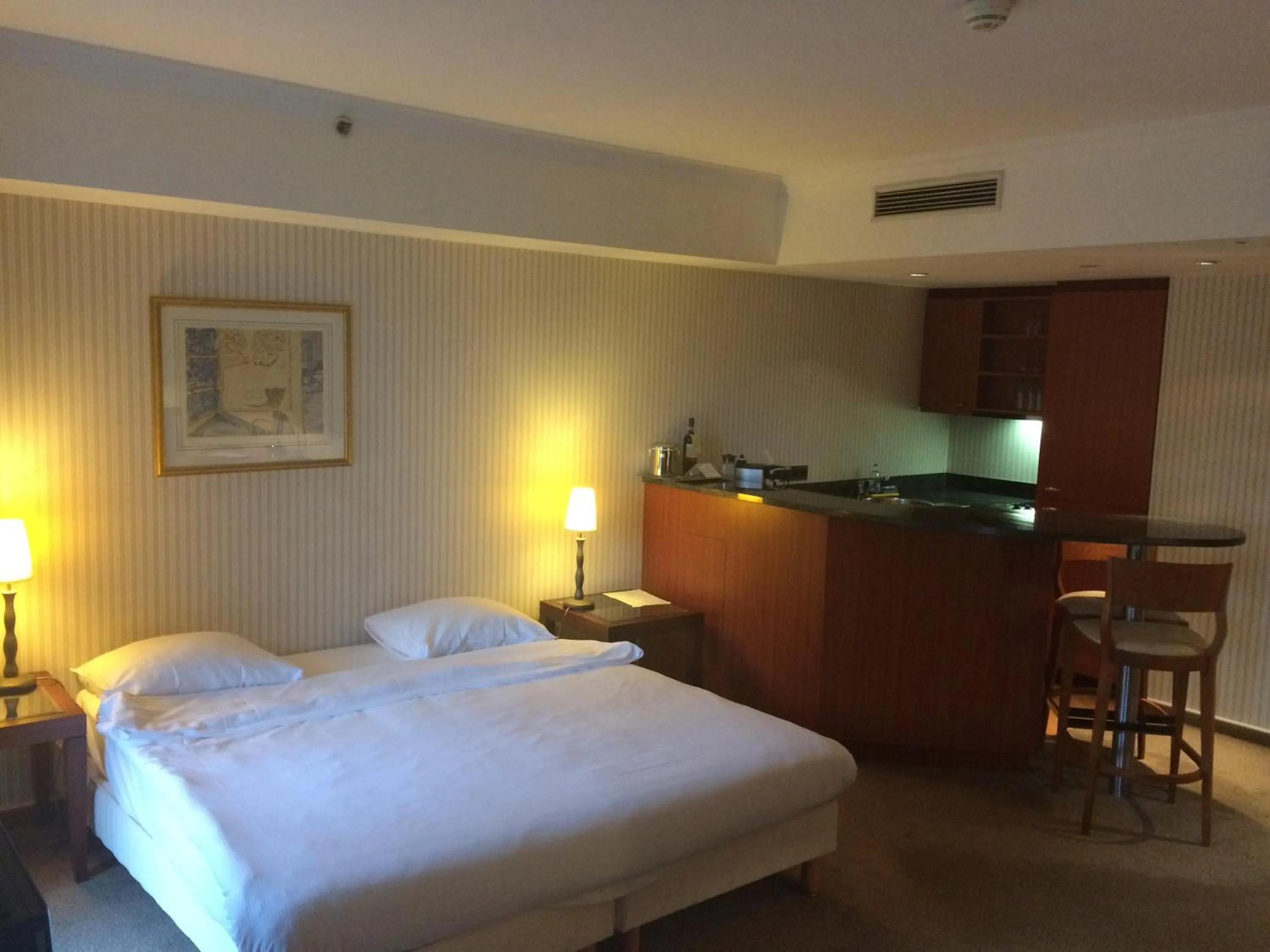 Bed in B-aparthotel Ambiorix