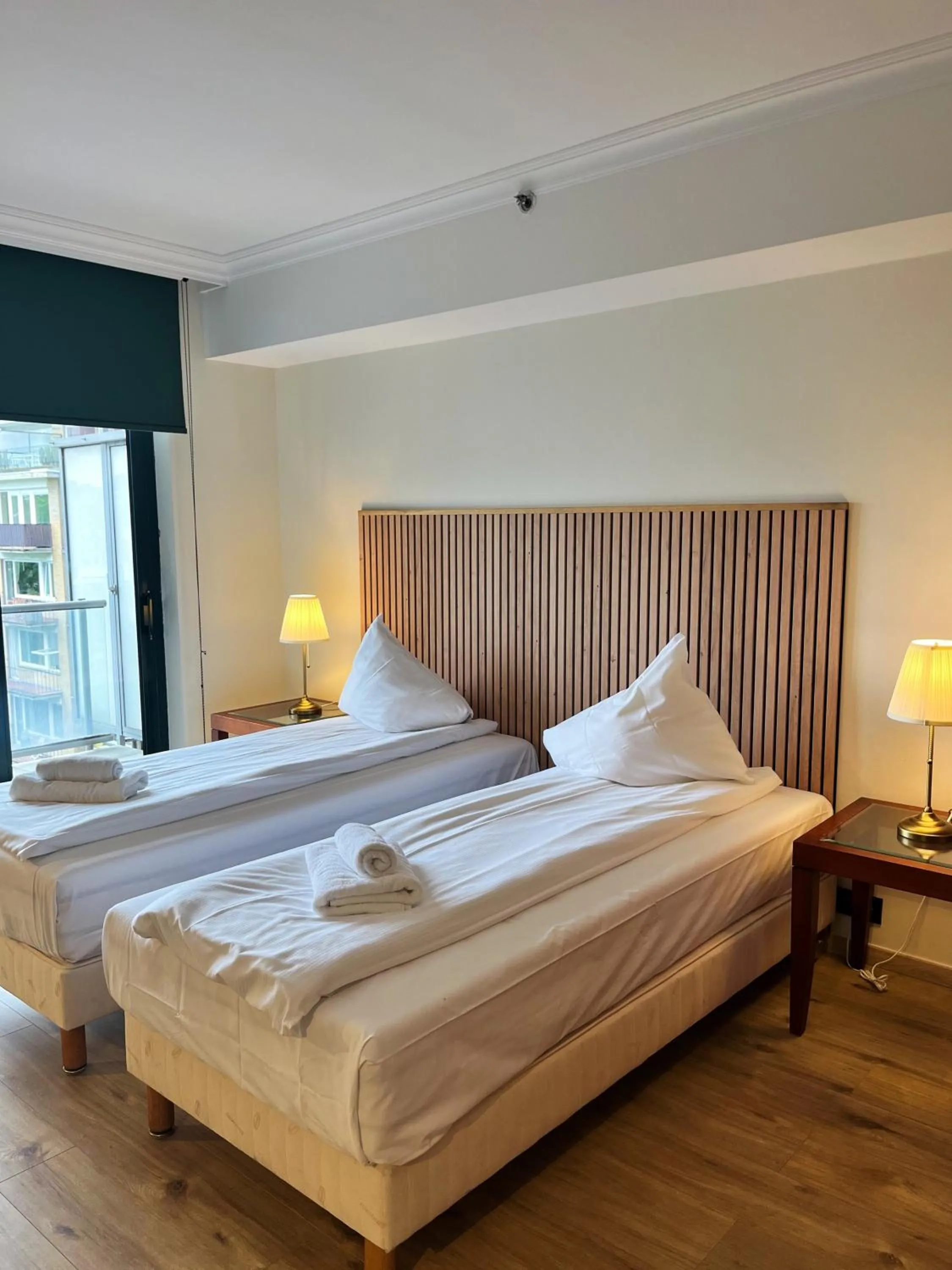 Bed in B-aparthotel Ambiorix