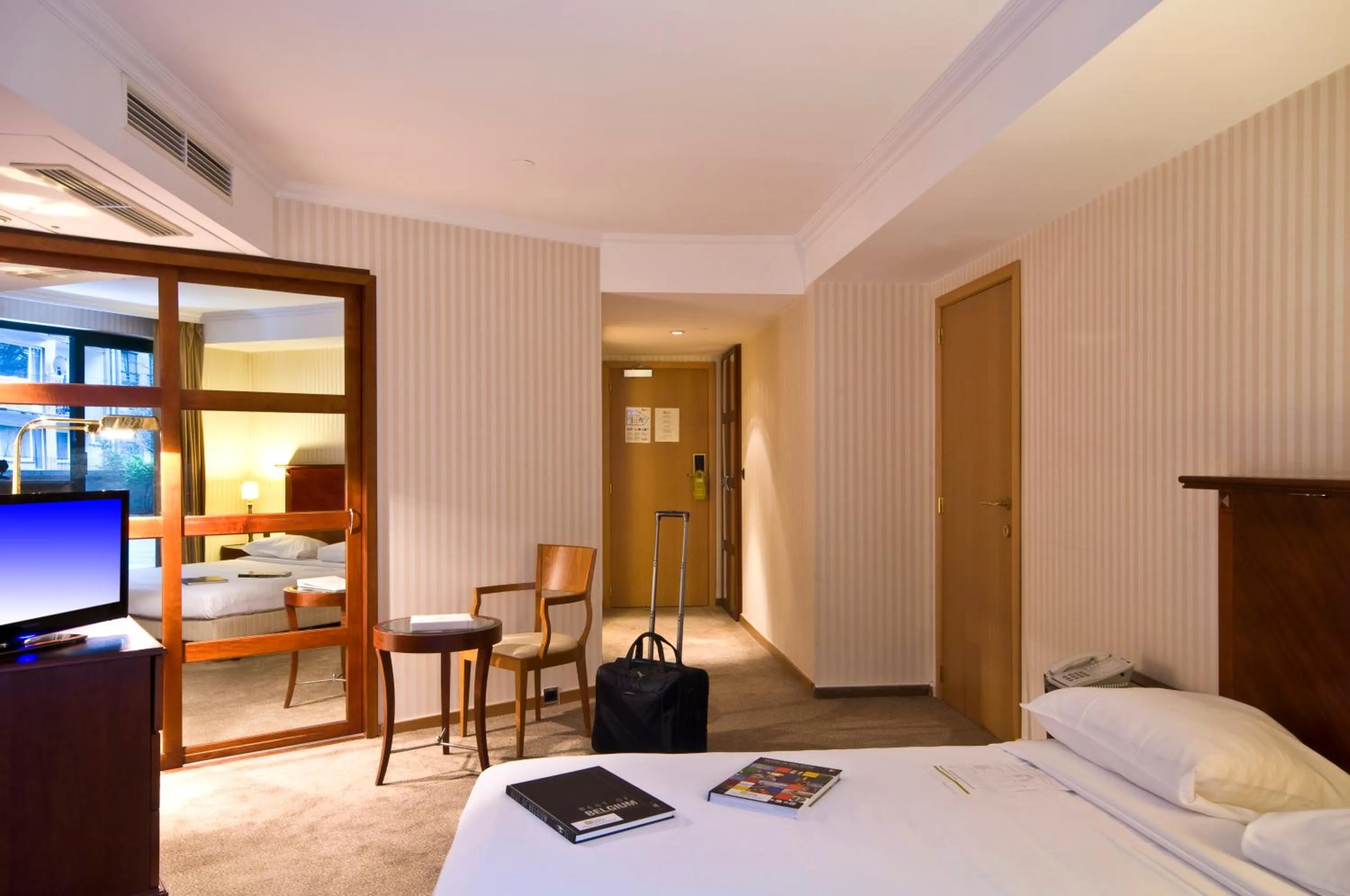 Bed in B-aparthotel Ambiorix