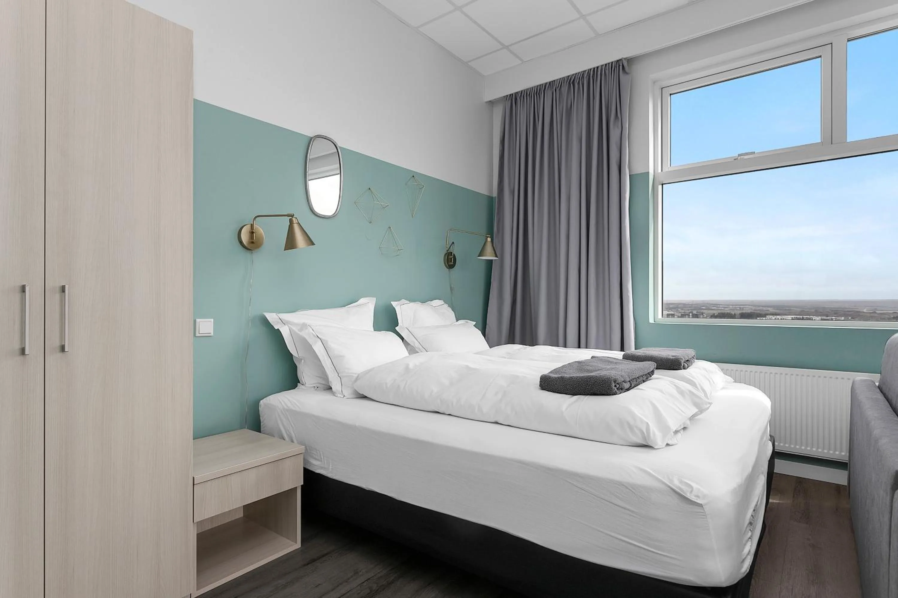 Bed in Icelandic Apartments by Heimaleiga