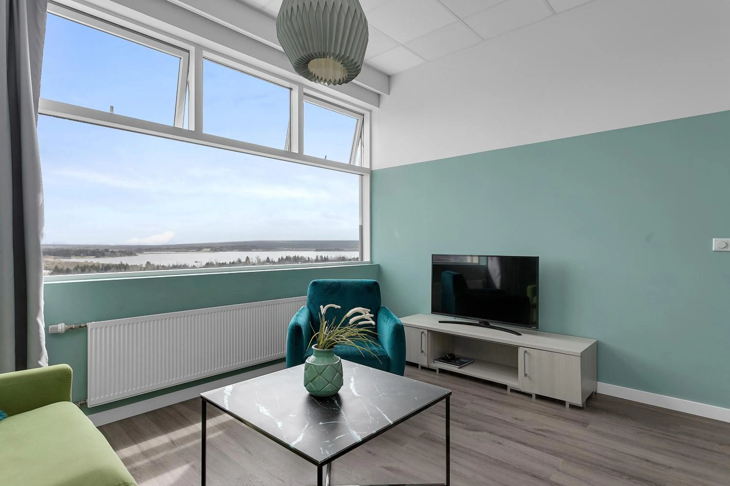 Communal lounge/ TV room in Icelandic Apartments by Heimaleiga