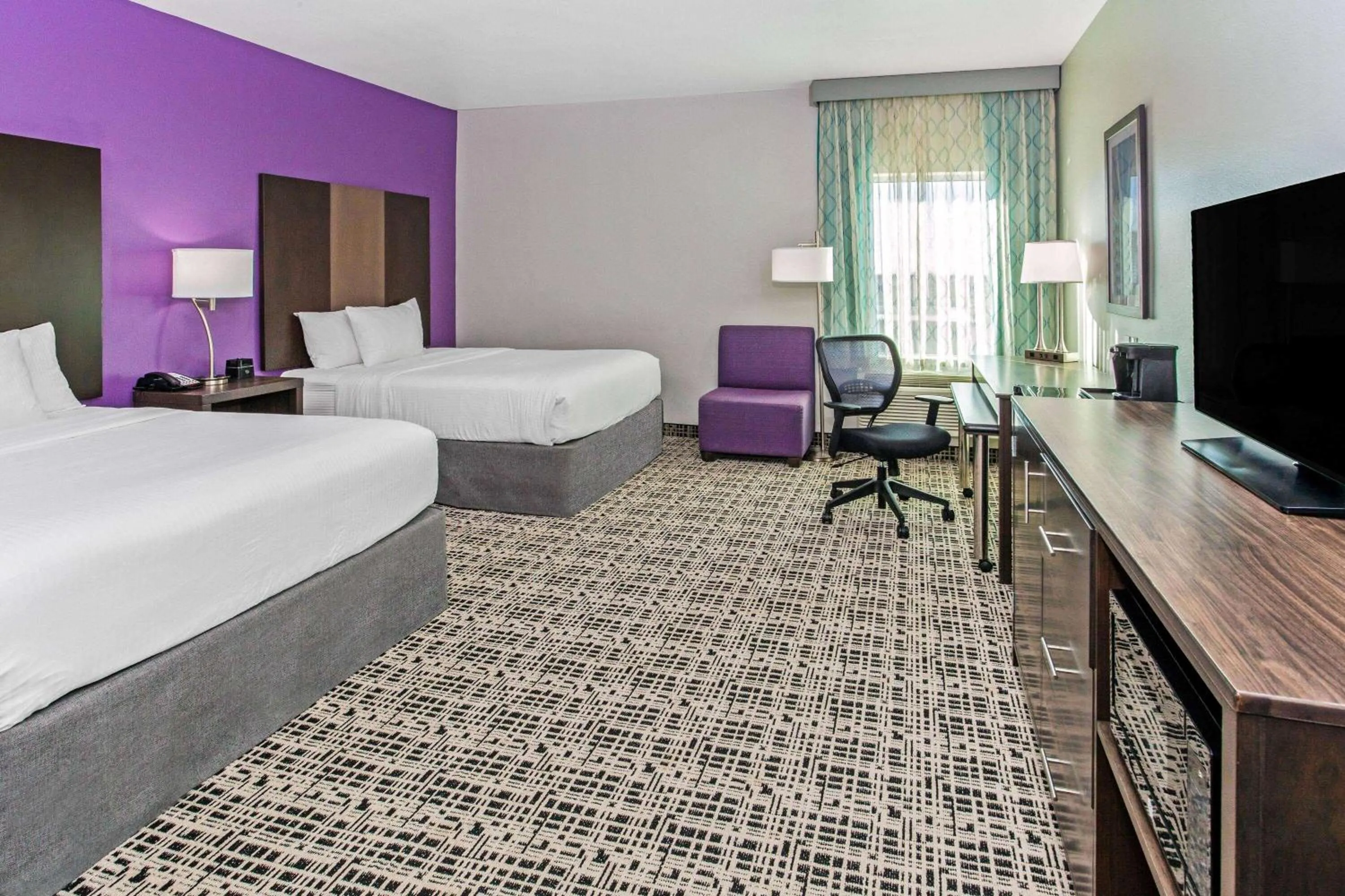 Photo of the whole room, Bed in La Quinta by Wyndham Lubbock South