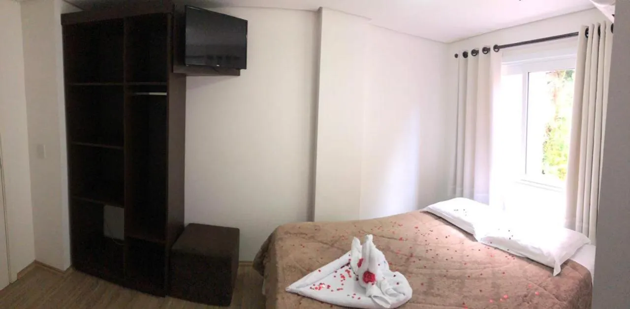 Bed in Pousada Beija Flor Centro