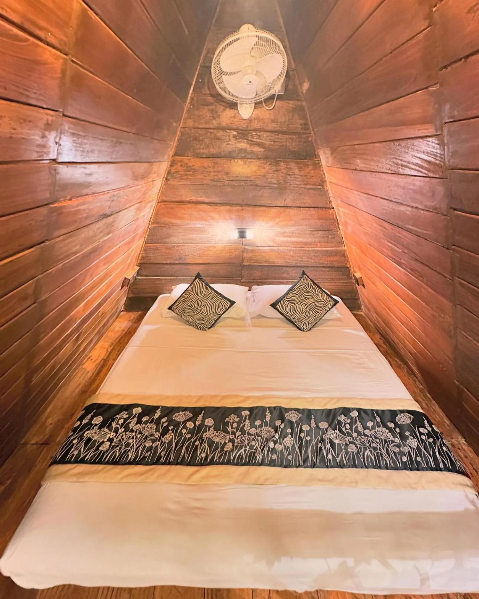 Bed in Levona Garden Resort