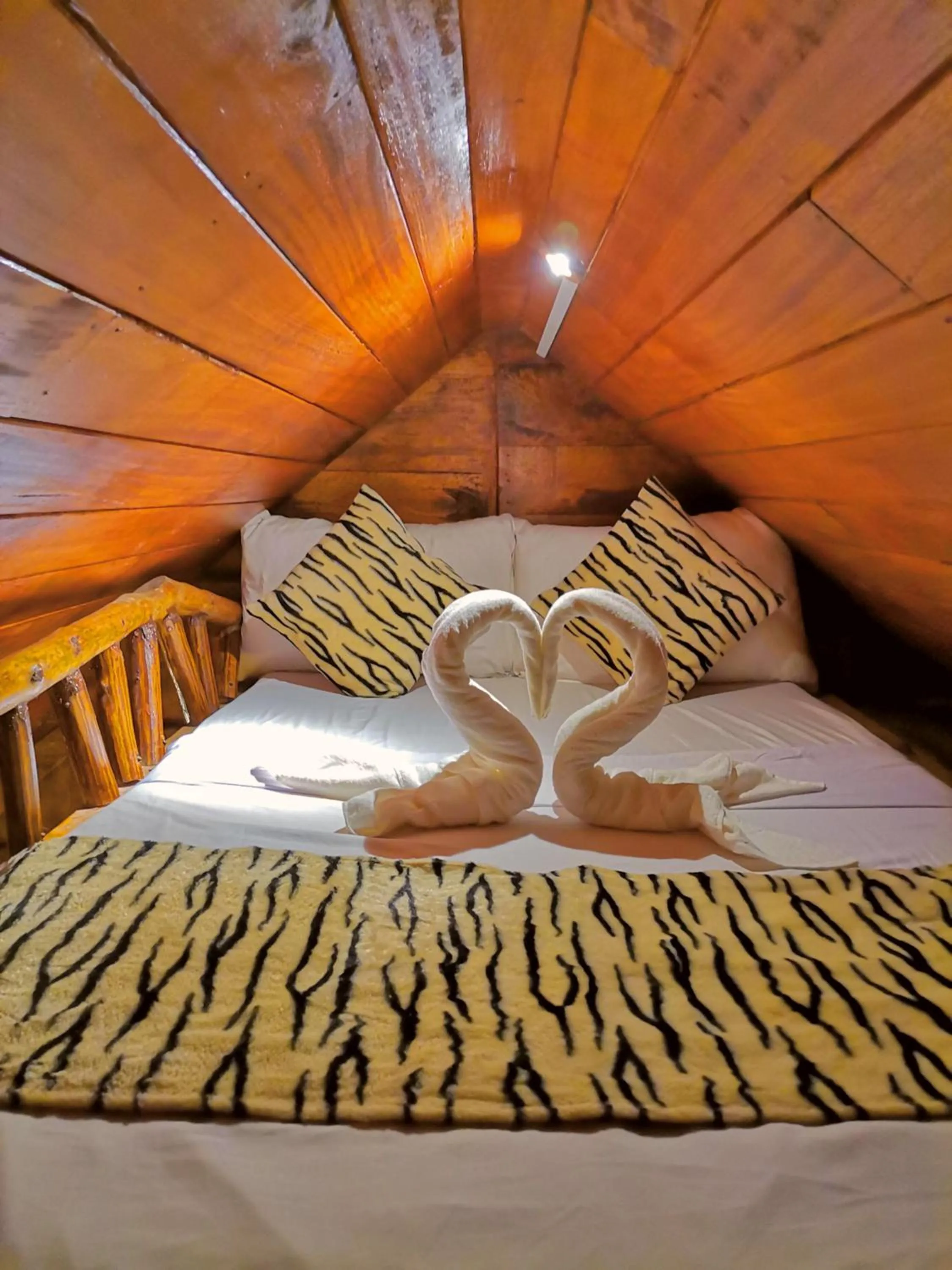 Bed in Levona Garden Resort