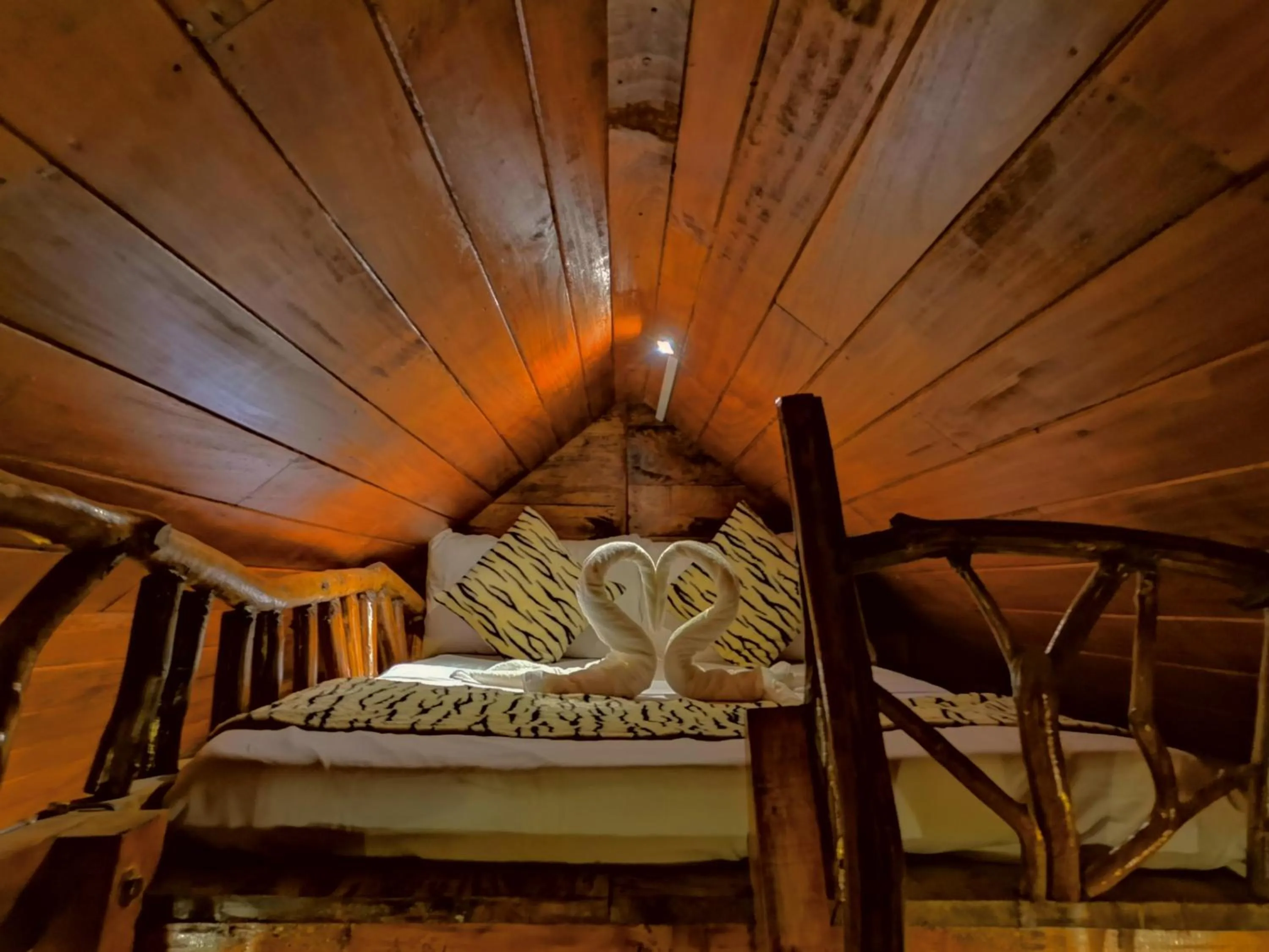 Bed in Levona Garden Resort