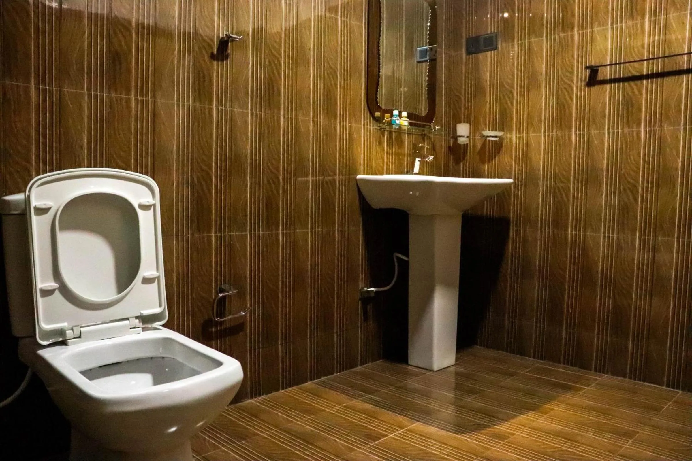 Shower in Levona Garden Resort