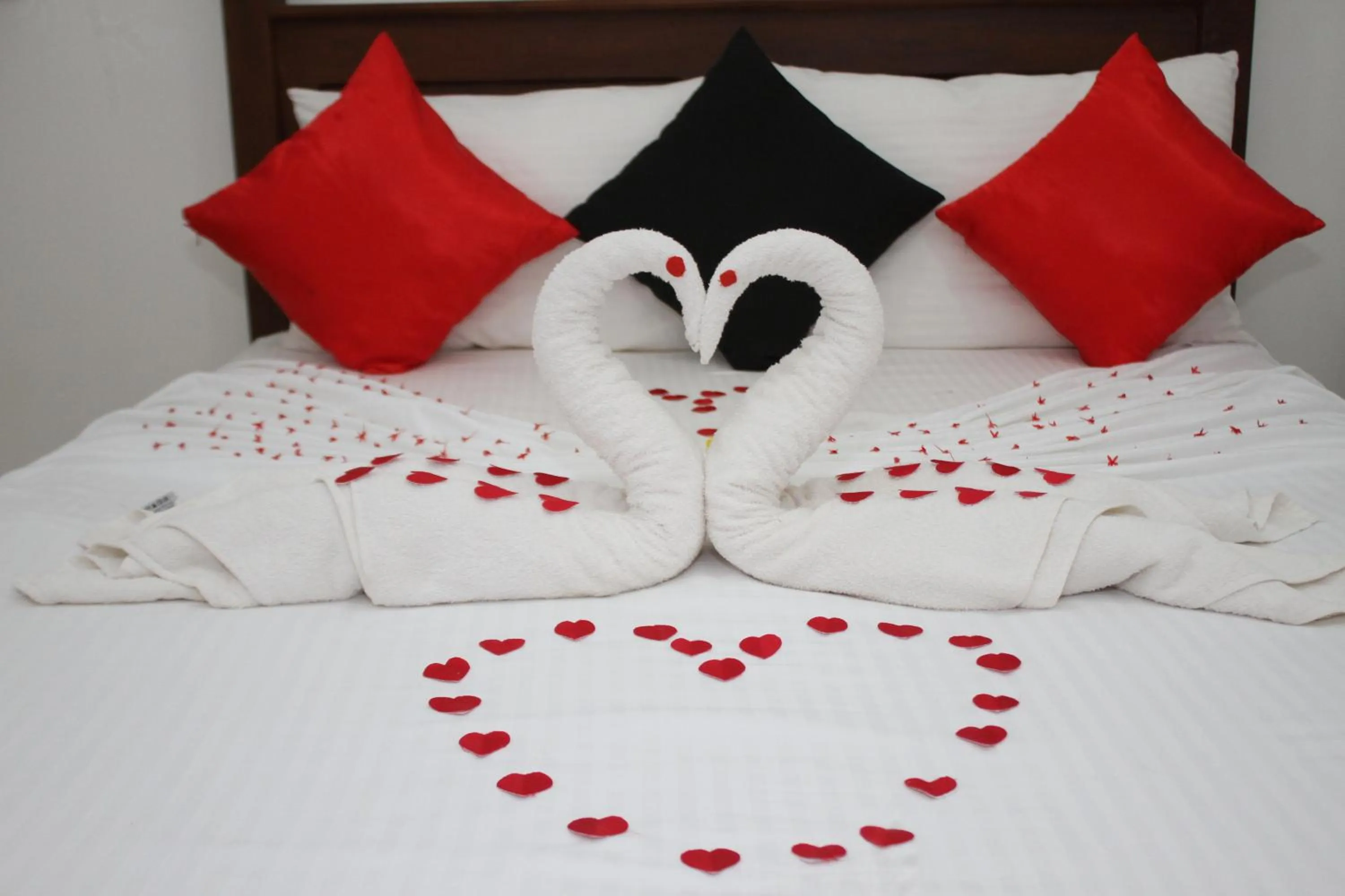 Bed in Levona Garden Resort