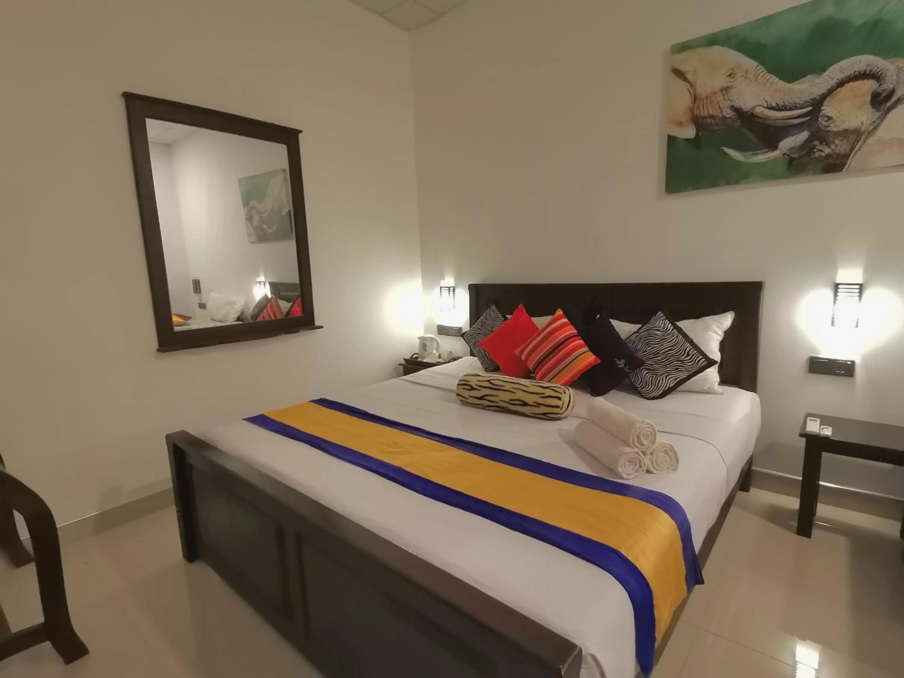 Bed in Levona Garden Resort