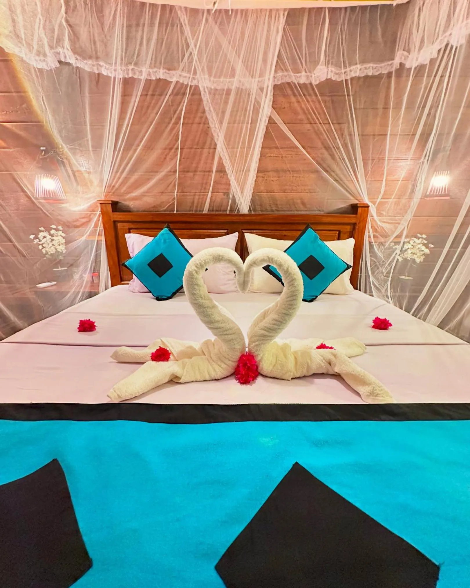 Bed in Levona Garden Resort