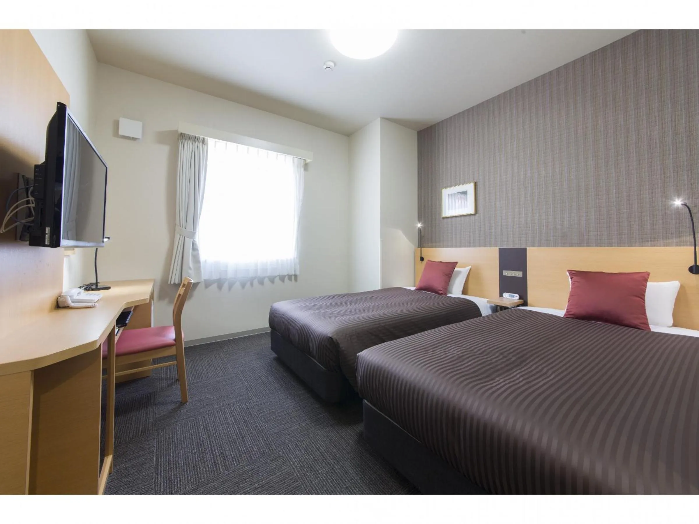 Bed in Hotel Super Tomari