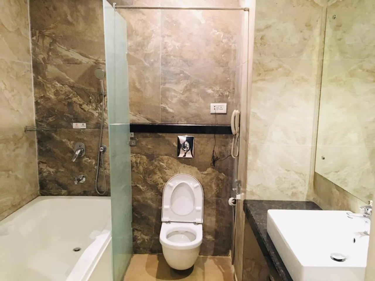 Bathroom in Clarion Inn Amps Patiala