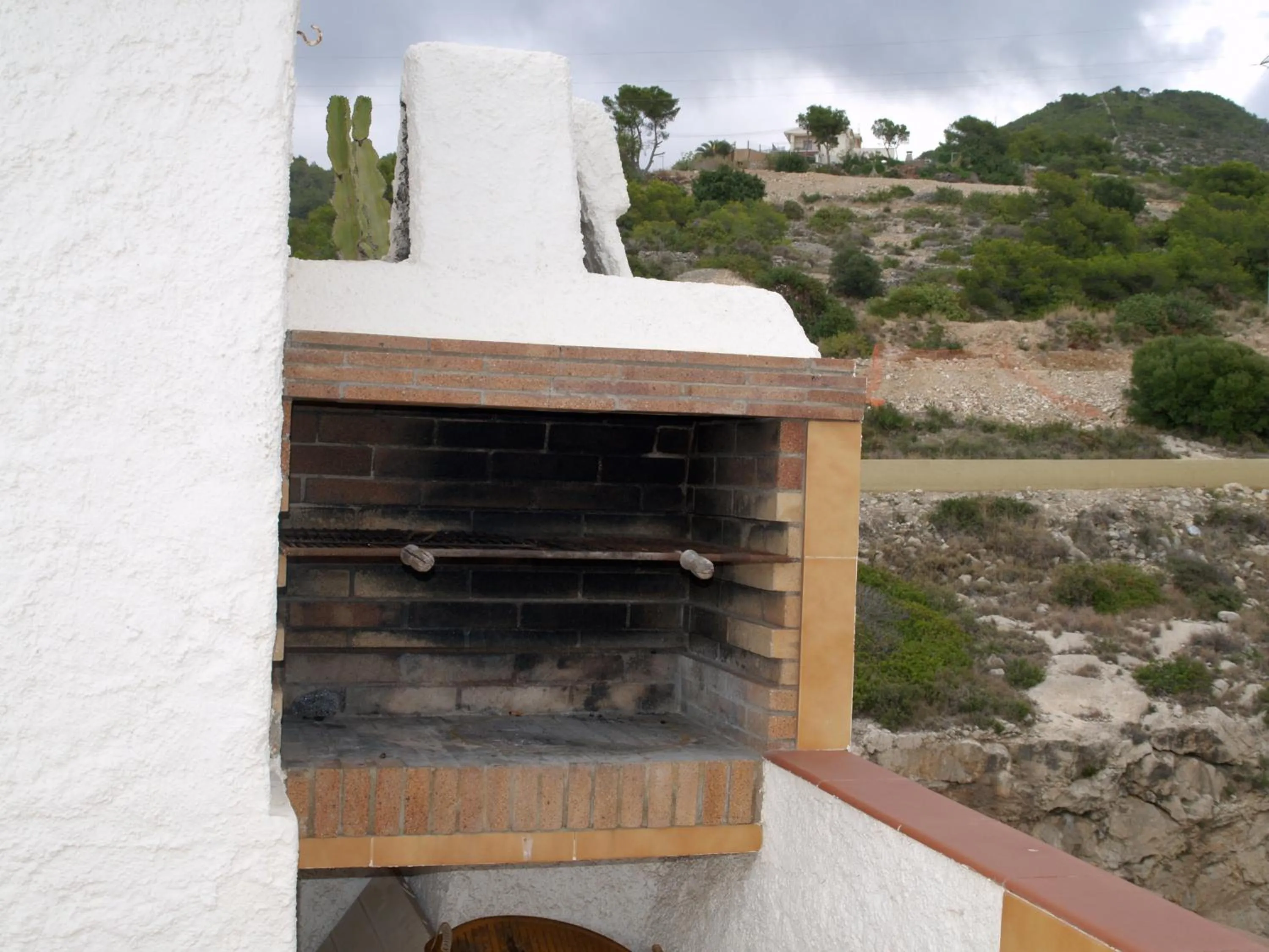 BBQ facilities in Apartamento en acantilado con wifi y aire acondicionado