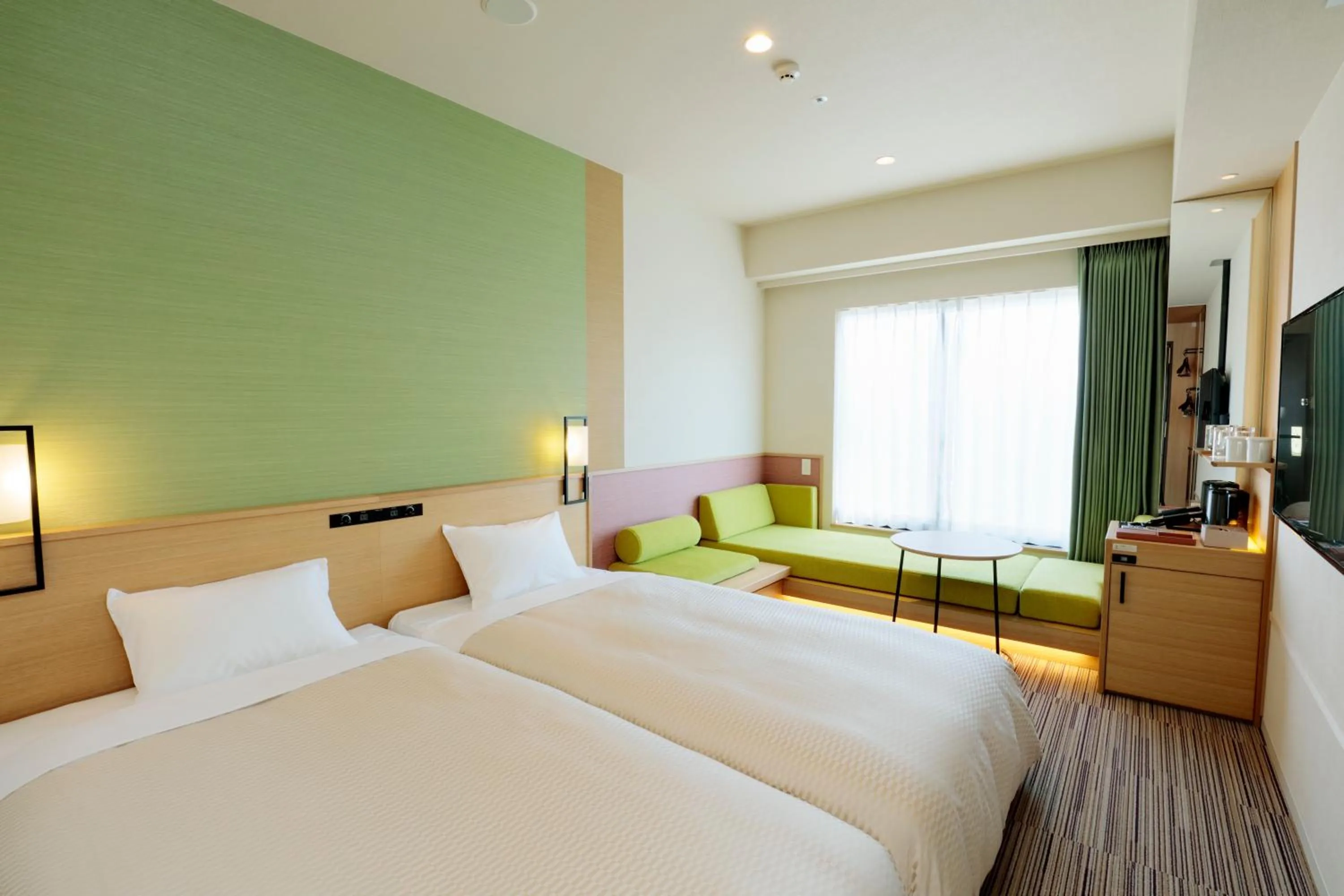 Bed in Candeo Hotels Osaka Namba