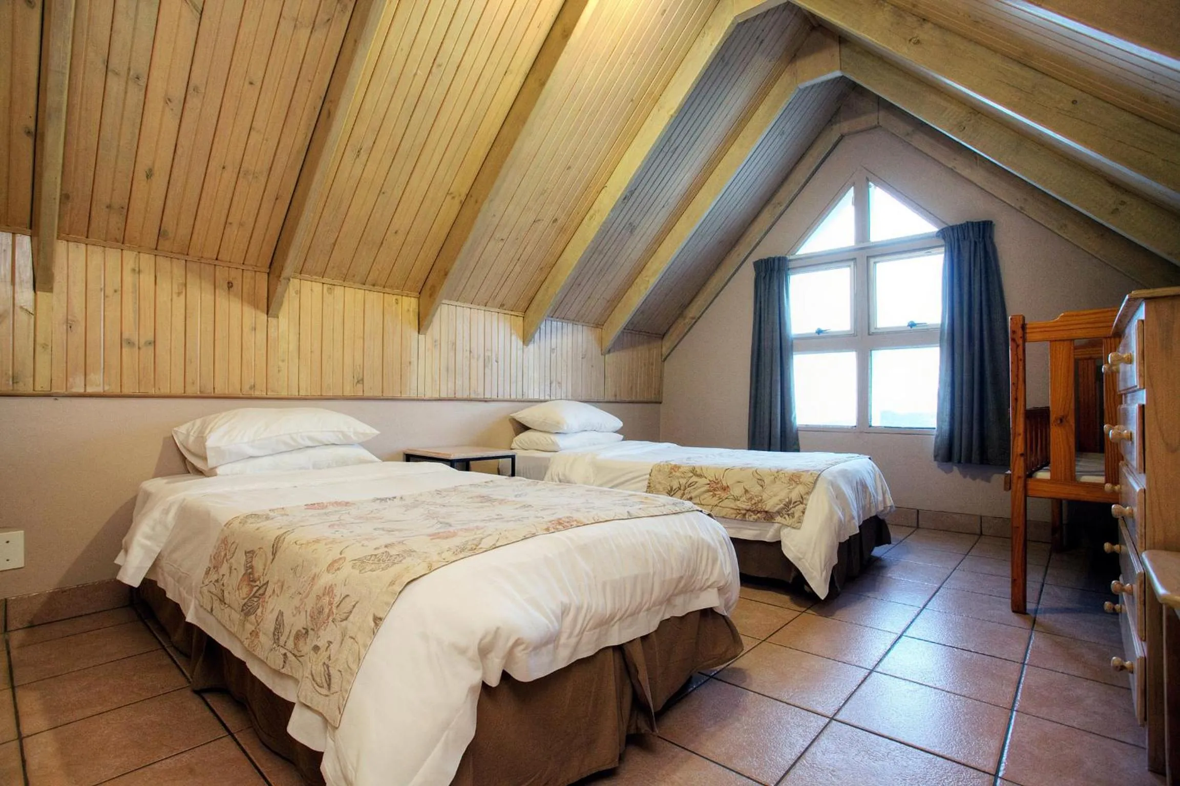 Bed in The Reef Apartments