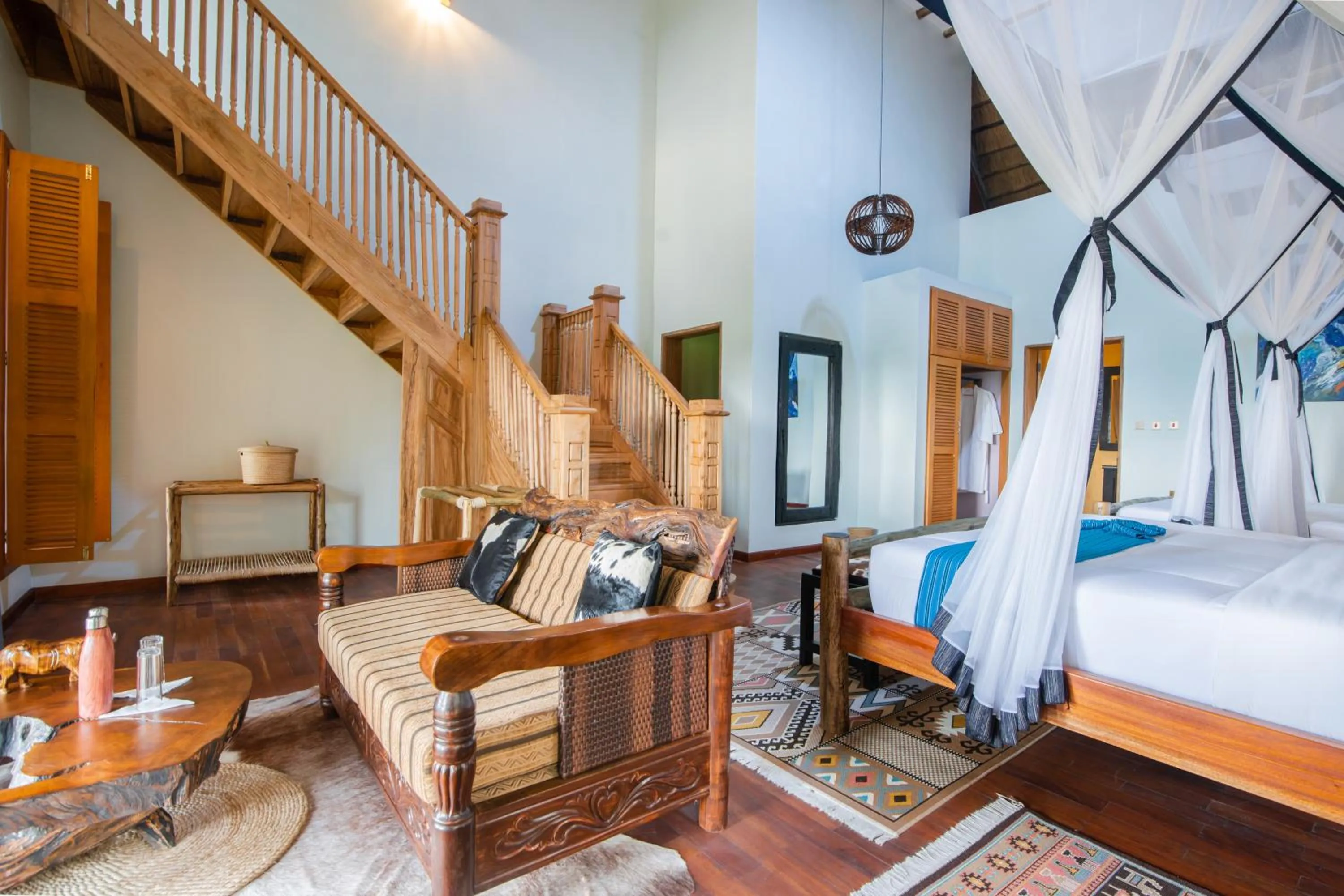 Seating area, Bed in Buffalo Safari Lodge