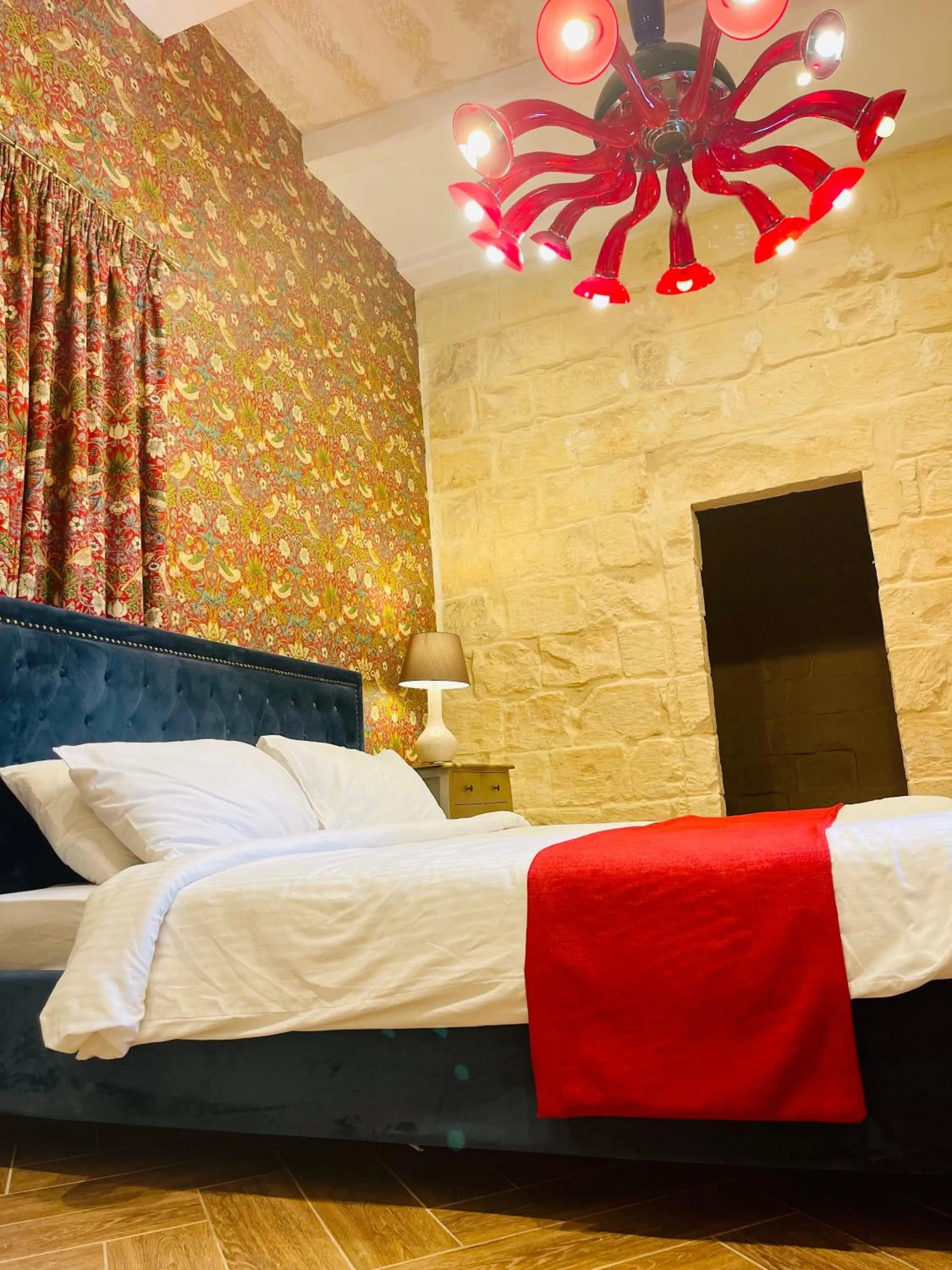 Bed in The Red Farm Relais & Spa