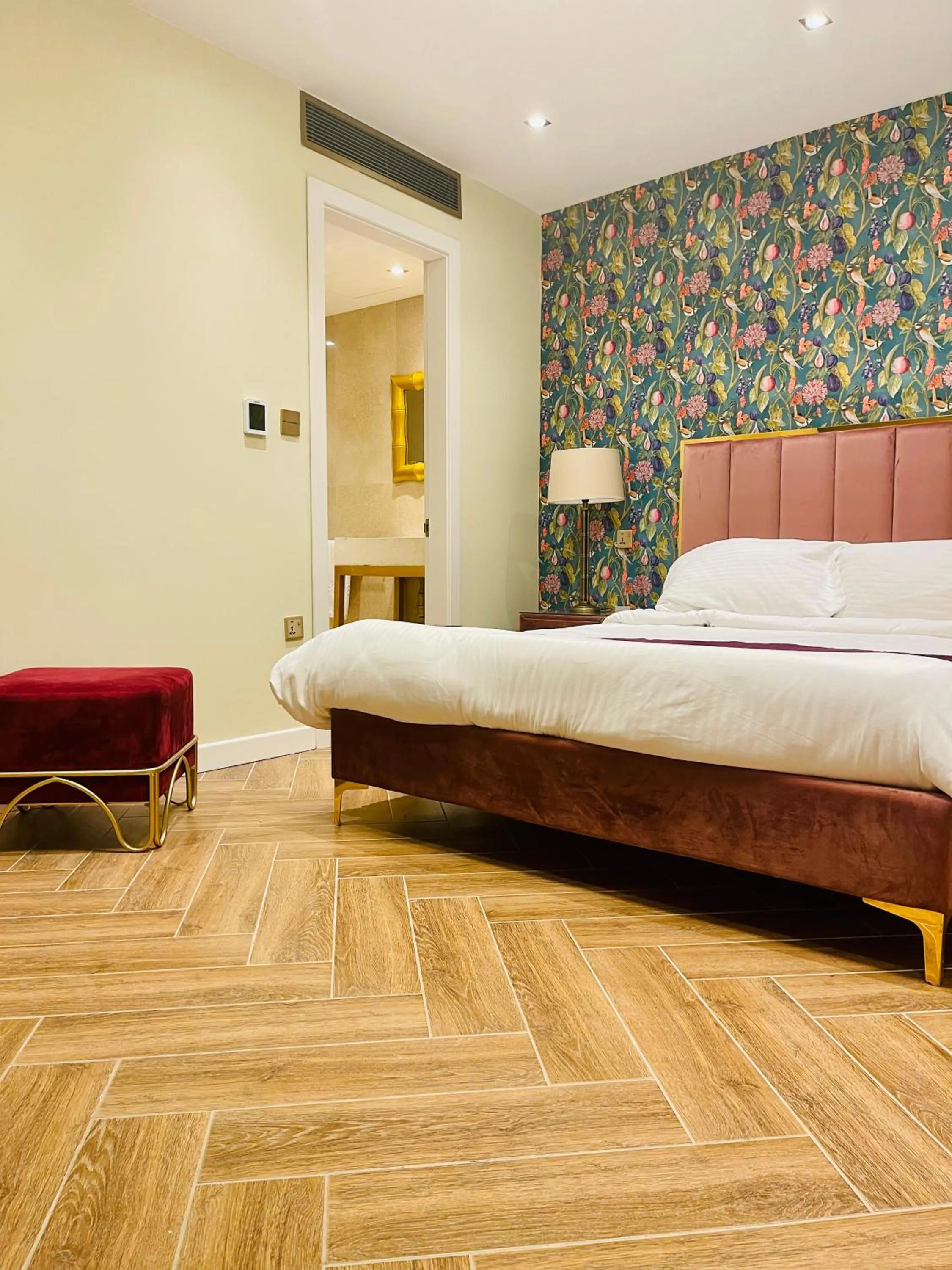 Bed in The Red Farm Relais & Spa