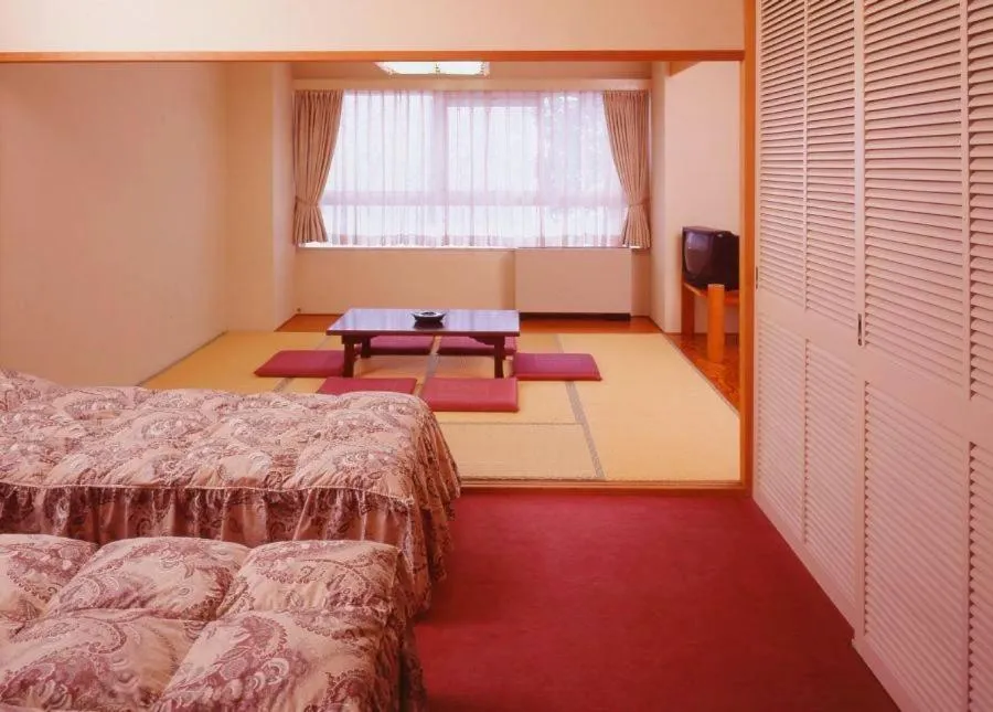 Bed in Hotel Chalet Yuzawa Ginsui