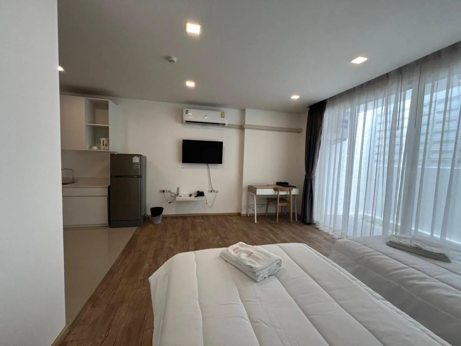 Bed in Karin hotel & Service apartment - SHA Extra Plus