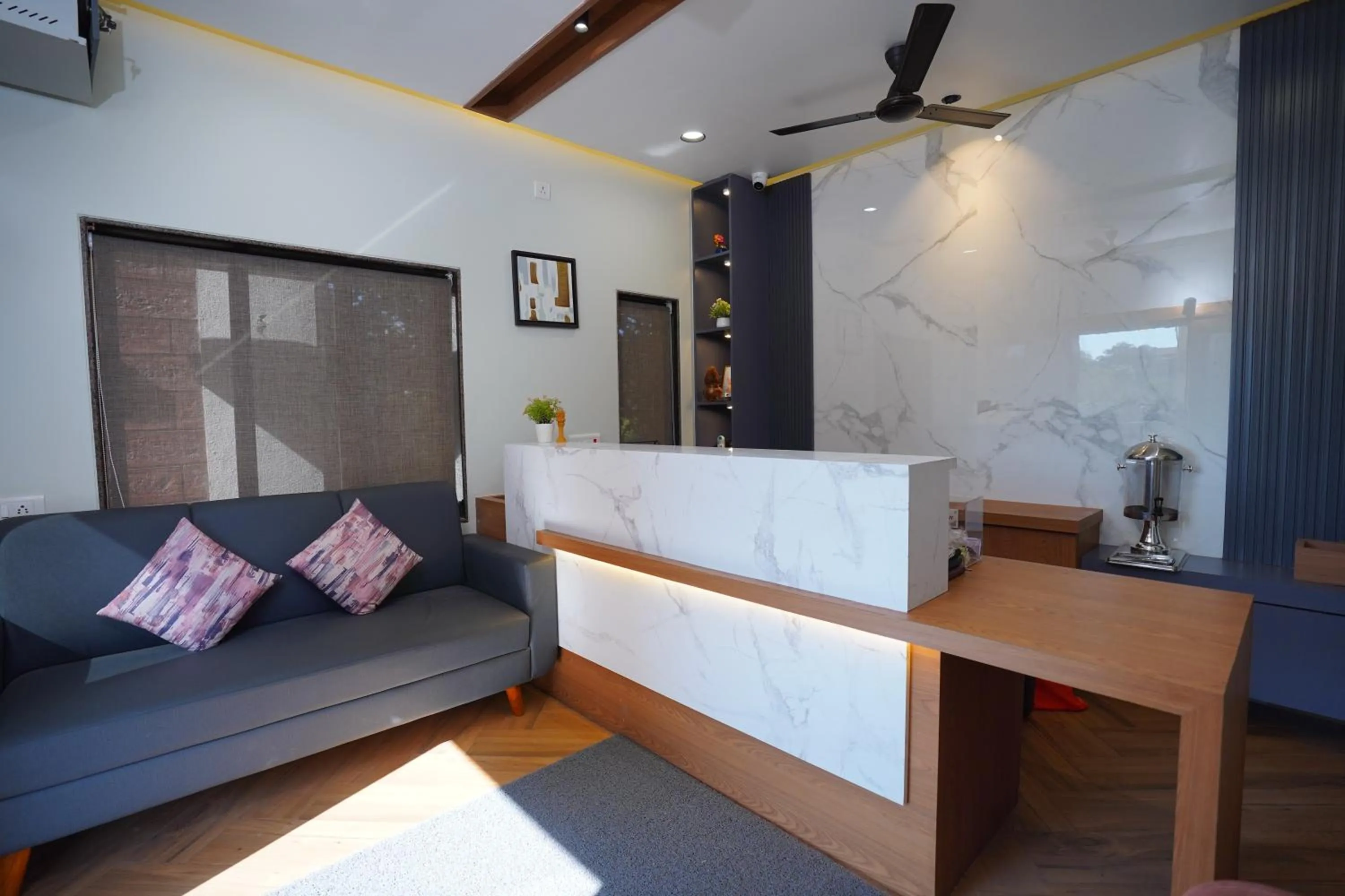 Seating area, Bed in Lotus The Lake View Resort