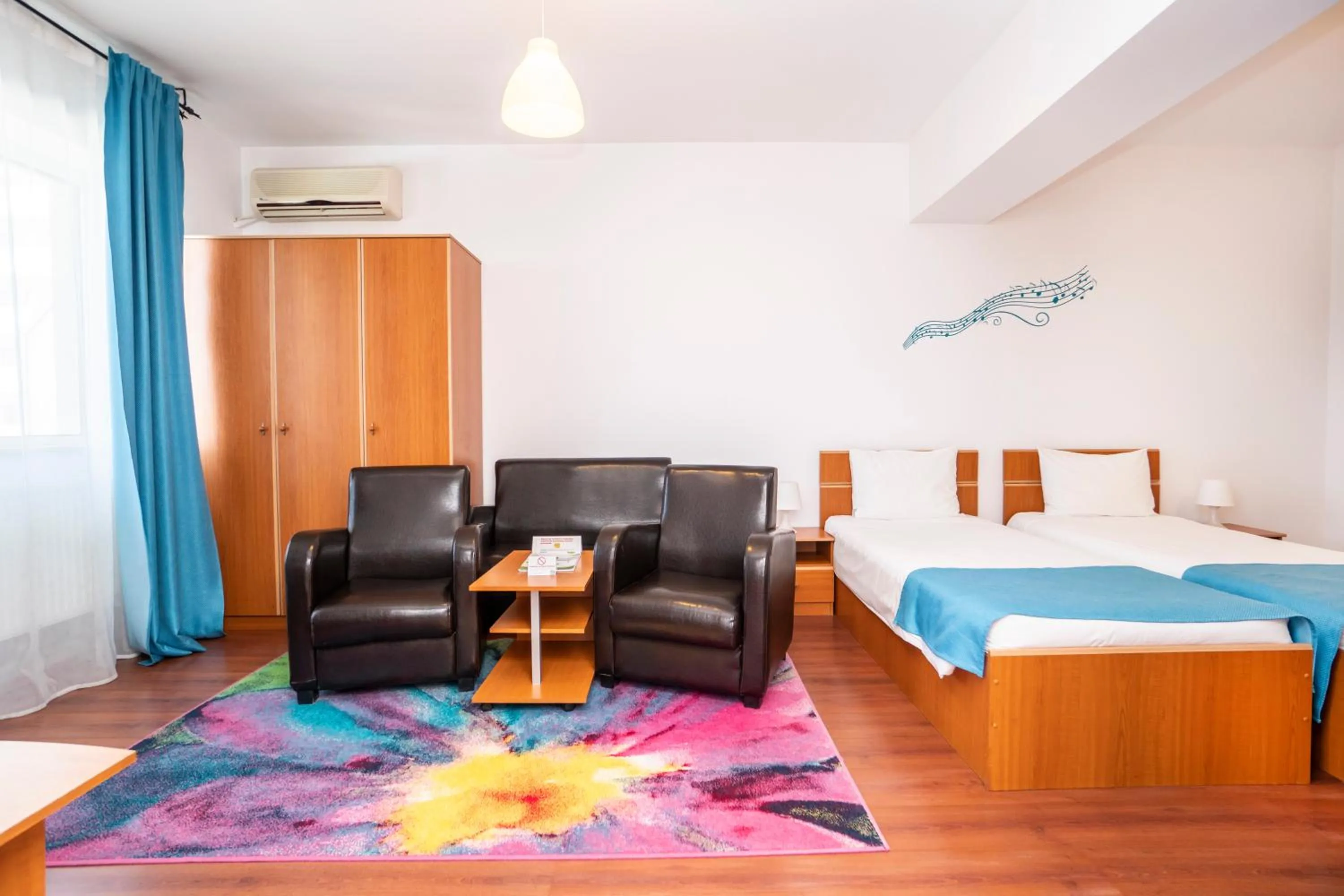 Seating area, Bed in West Gate Studios