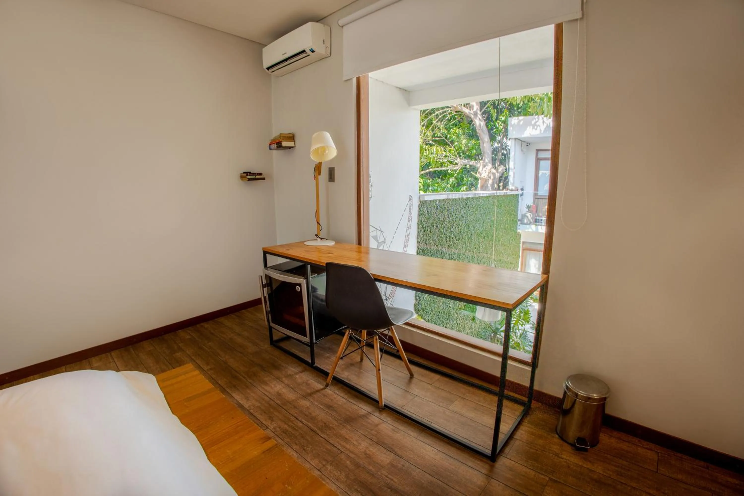 Bedroom in Cosmopolitano Hotel Boutique