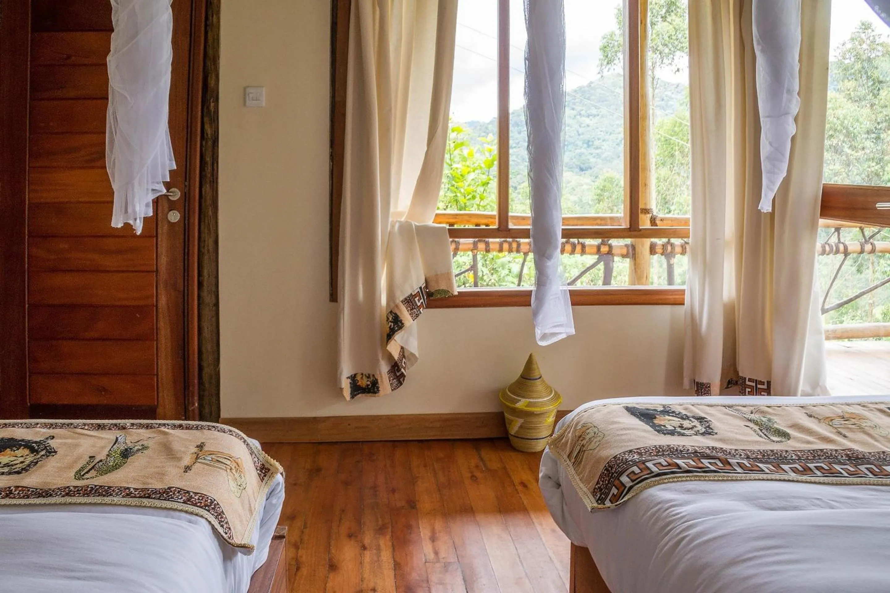 Photo of the whole room, Bed in Ichumbi Gorilla Lodge