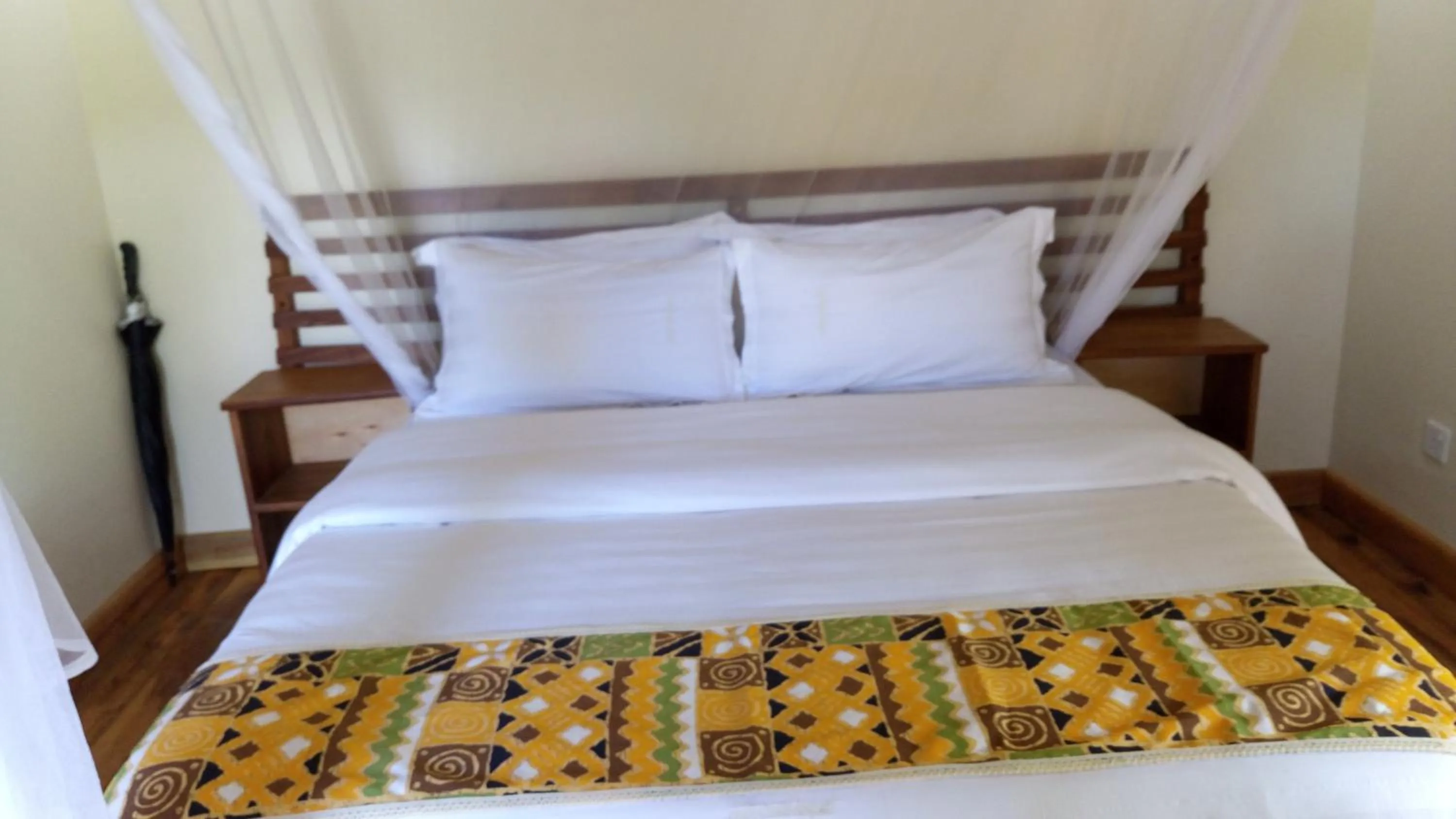 Bed in Ichumbi Gorilla Lodge