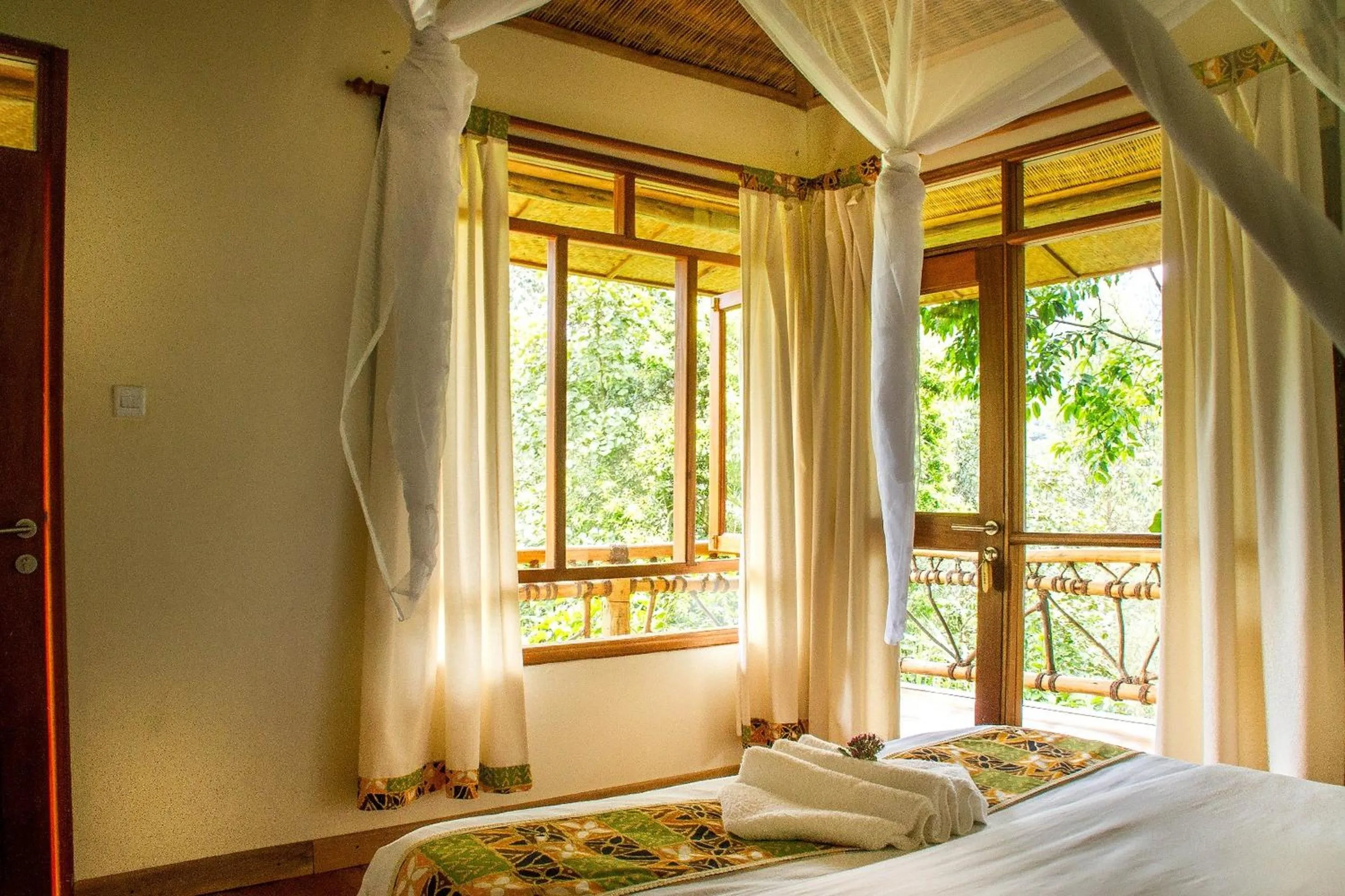 Garden view, Bed in Ichumbi Gorilla Lodge