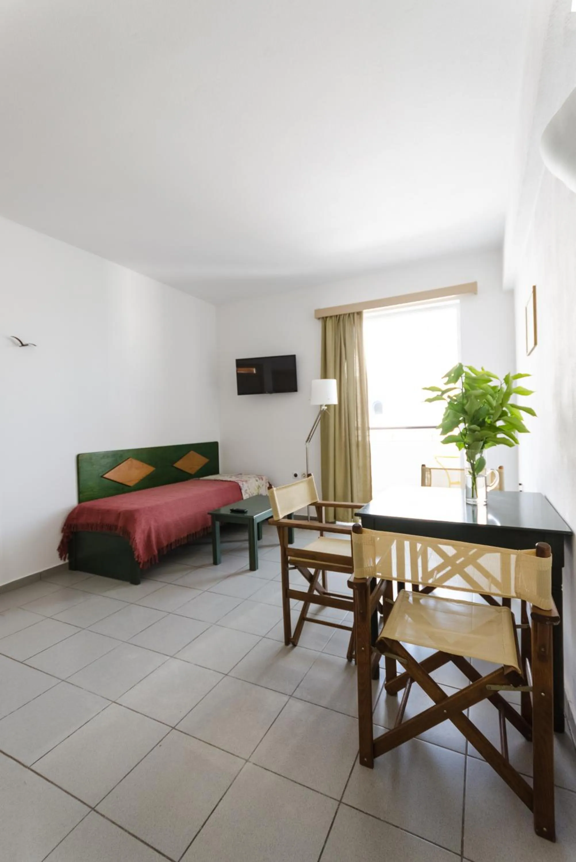 Bed in Happiness Apartments