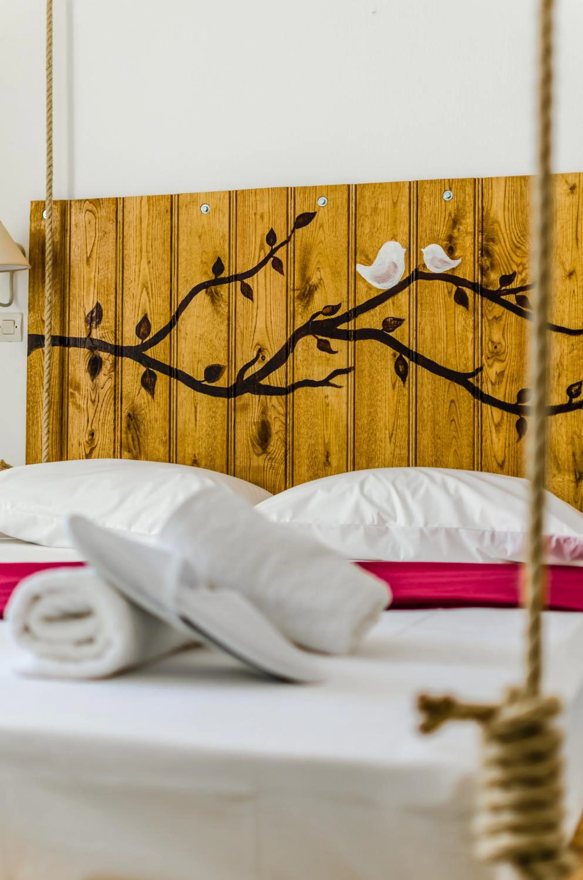 Bed in Happiness Apartments