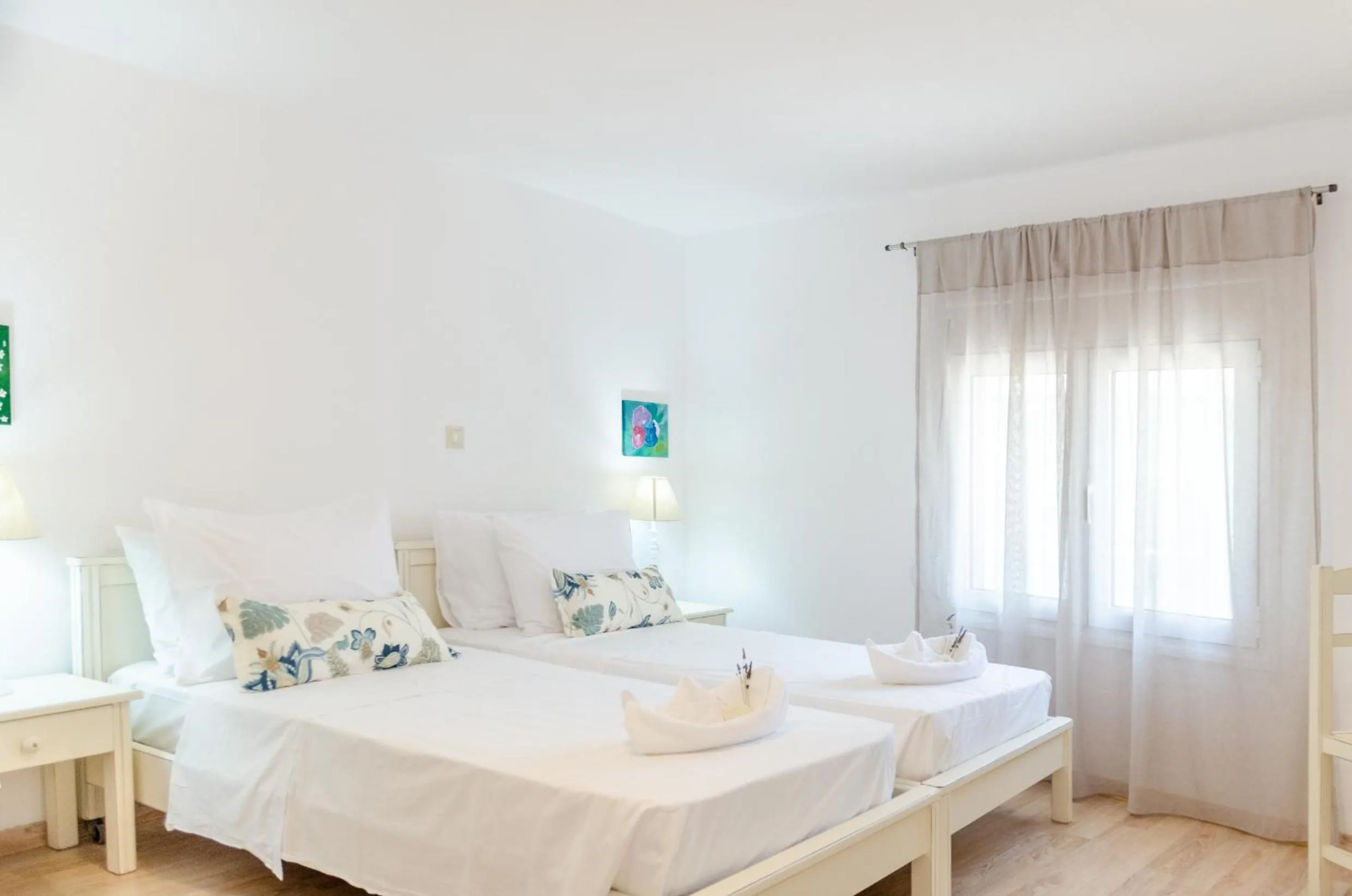 Bed in Happiness Apartments