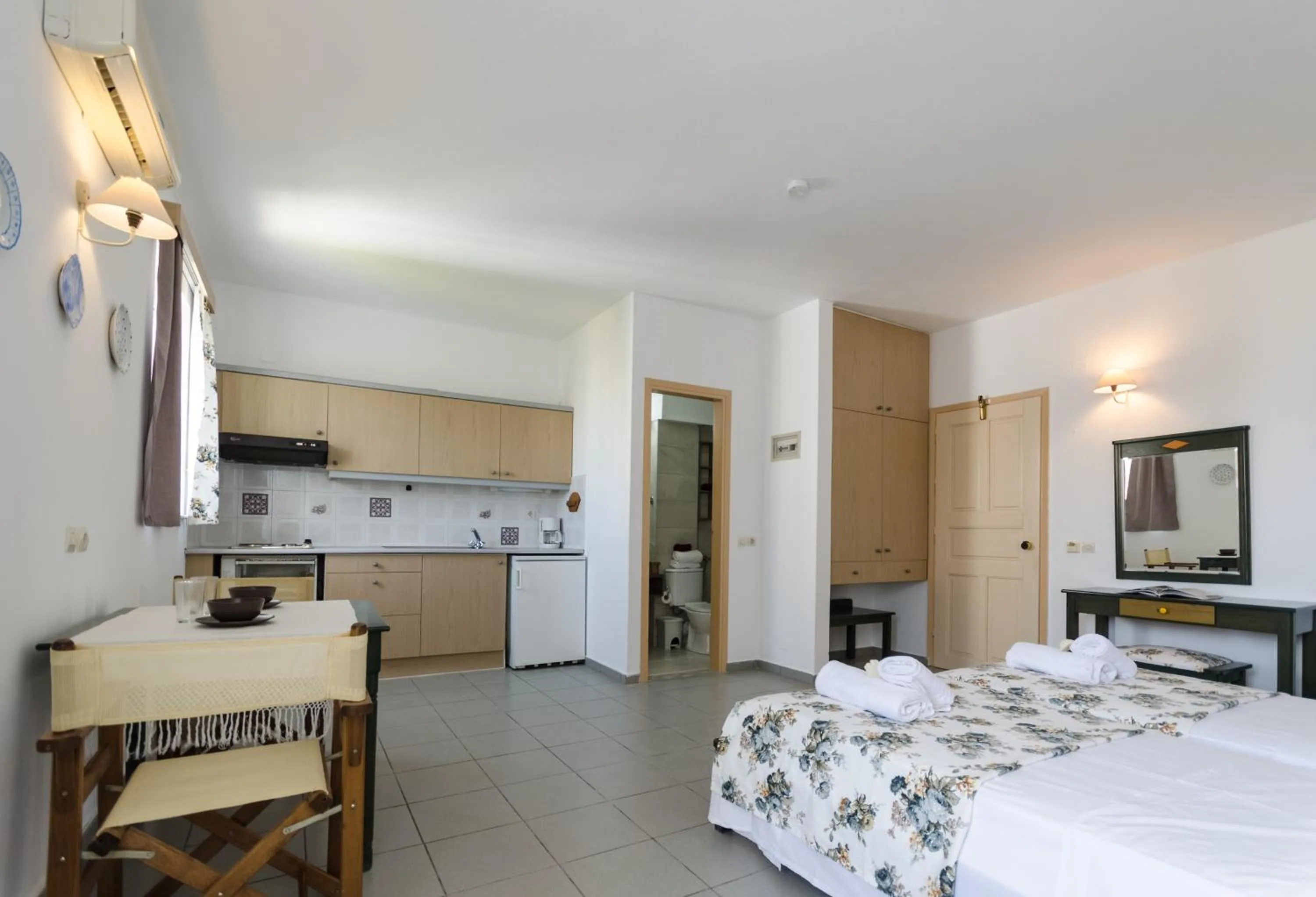 Bed in Happiness Apartments