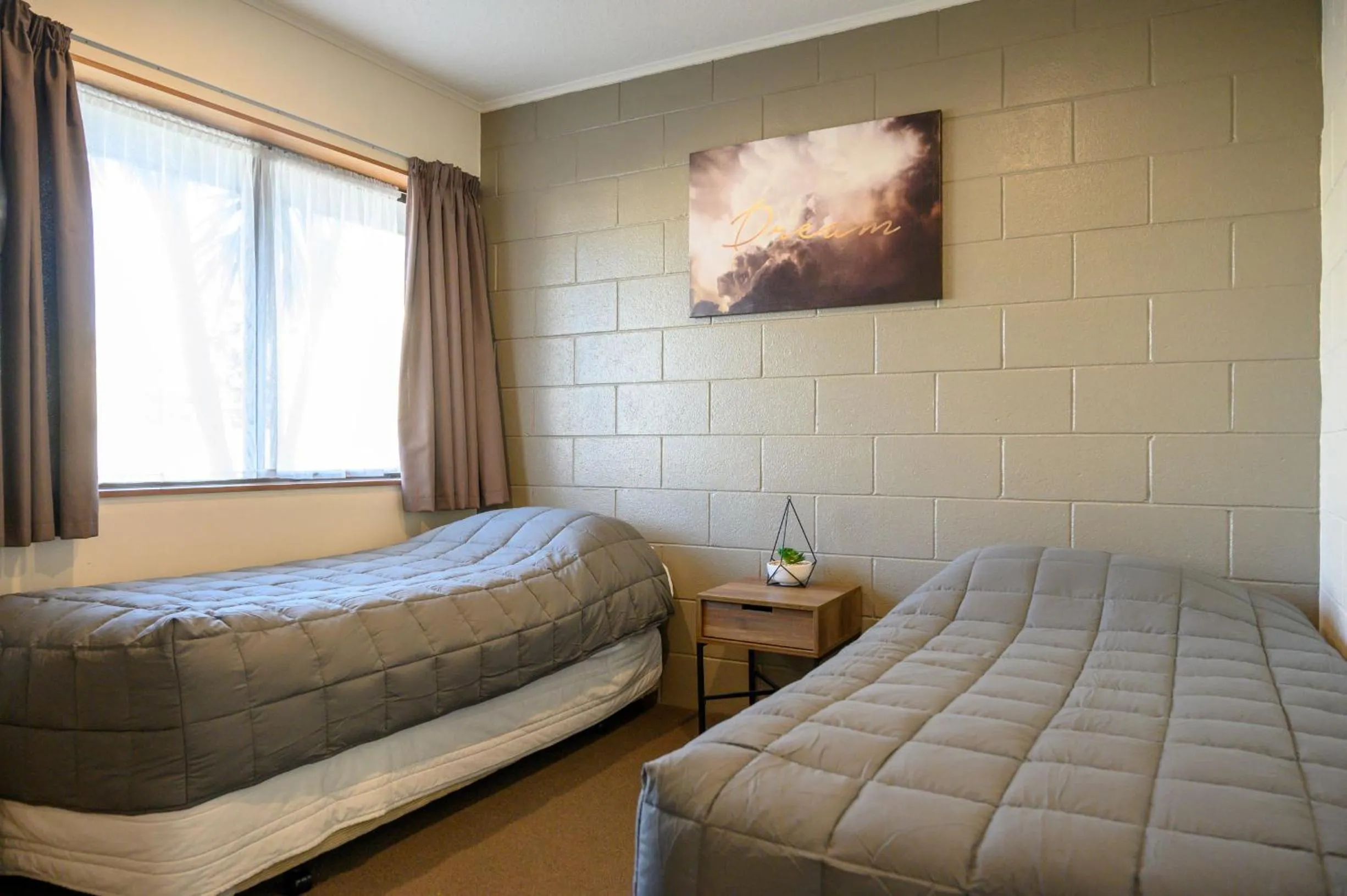 Bed in Foreshore Motor Lodge