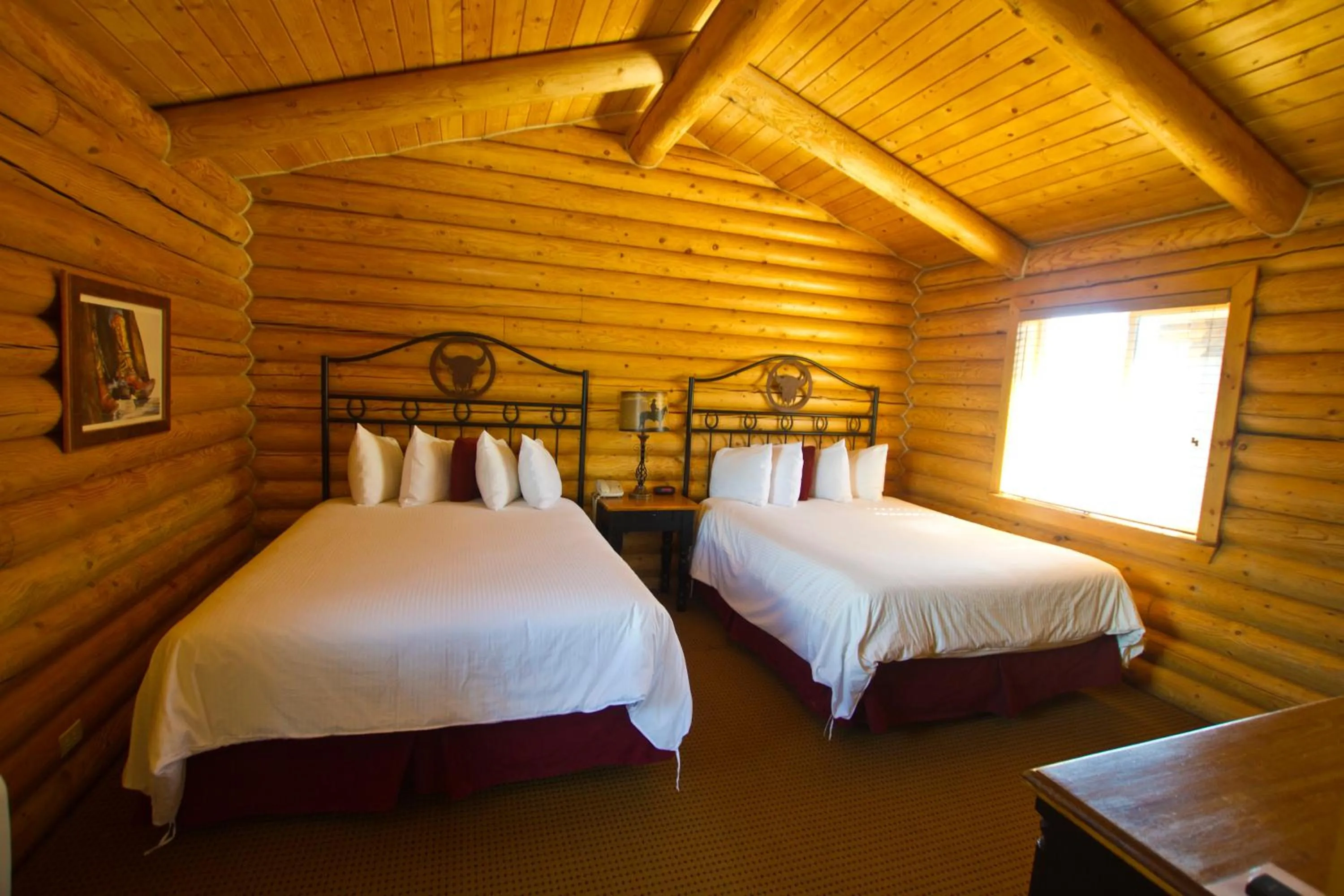 Photo of the whole room, Bed in Cody Cowboy Village