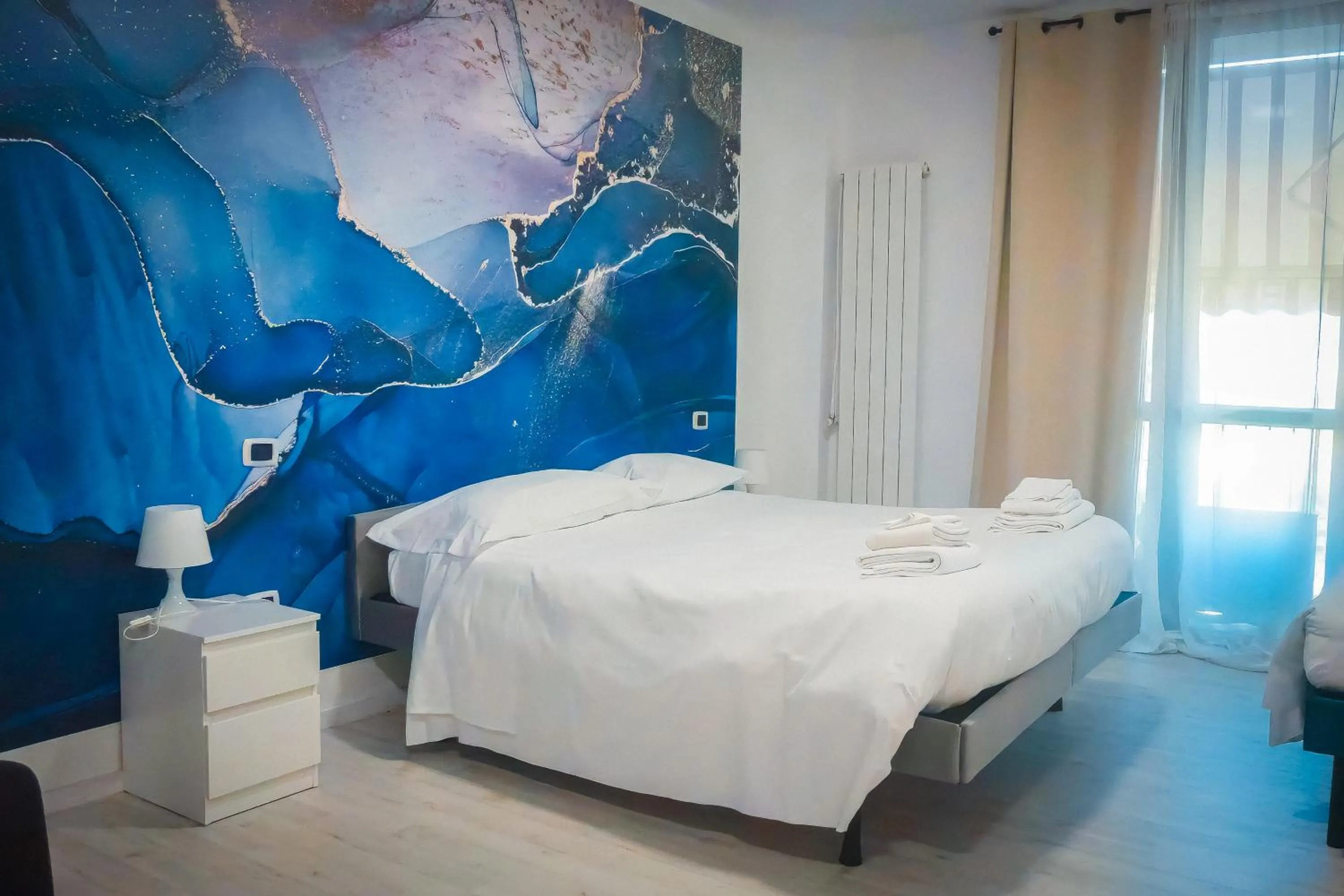 Bed in La Boheme SMART Hotel