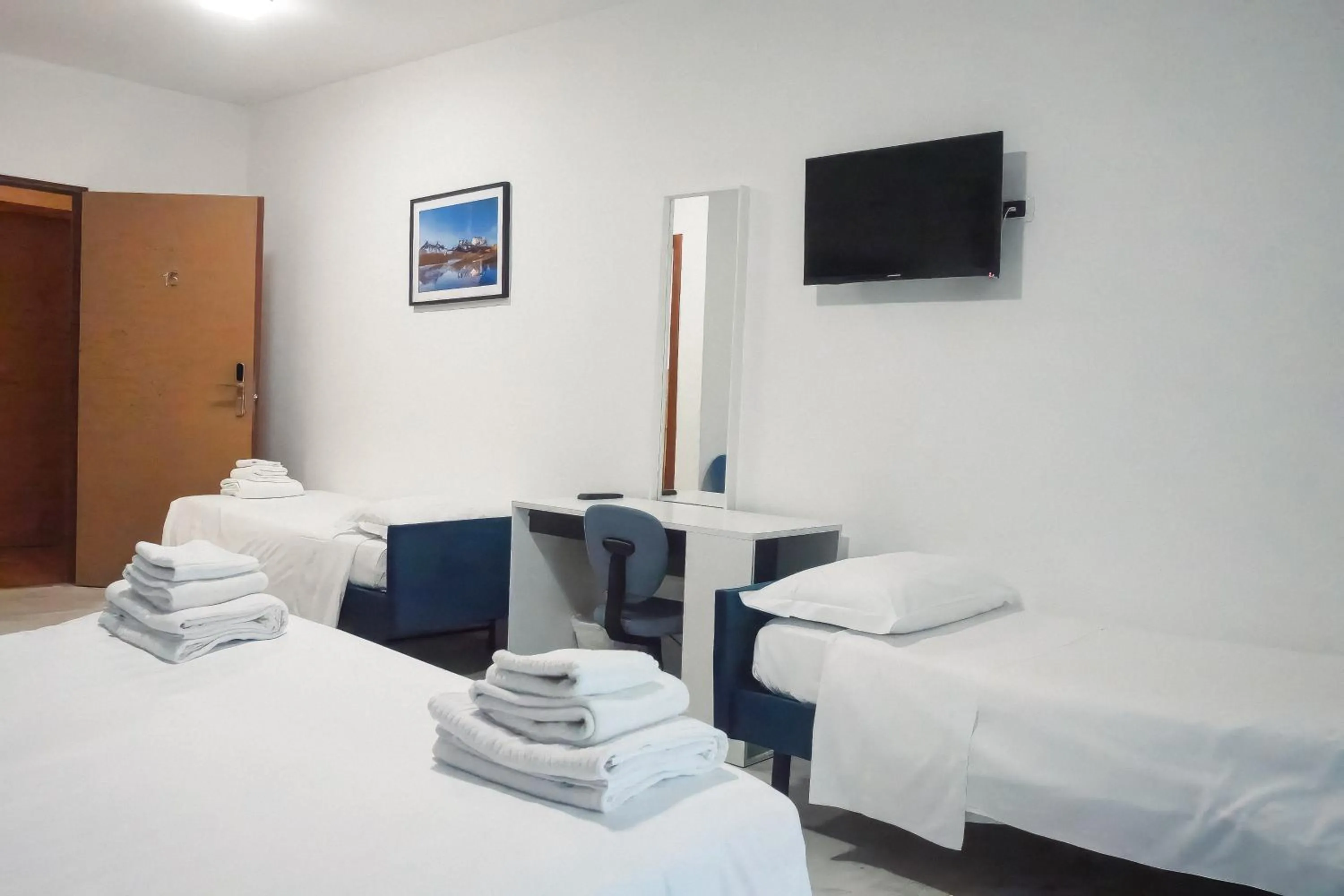 Bed in La Boheme SMART Hotel