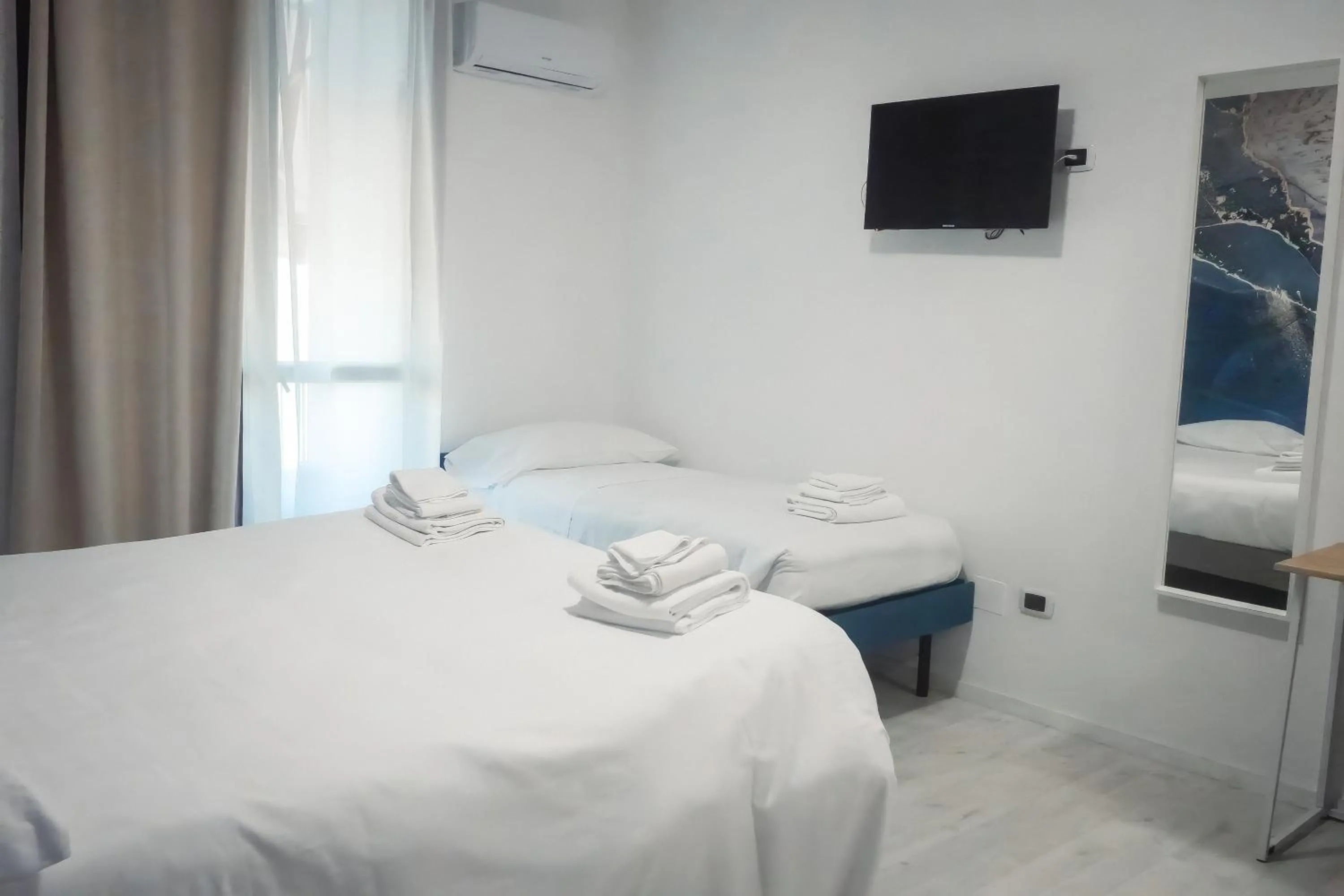 Bed in La Boheme SMART Hotel