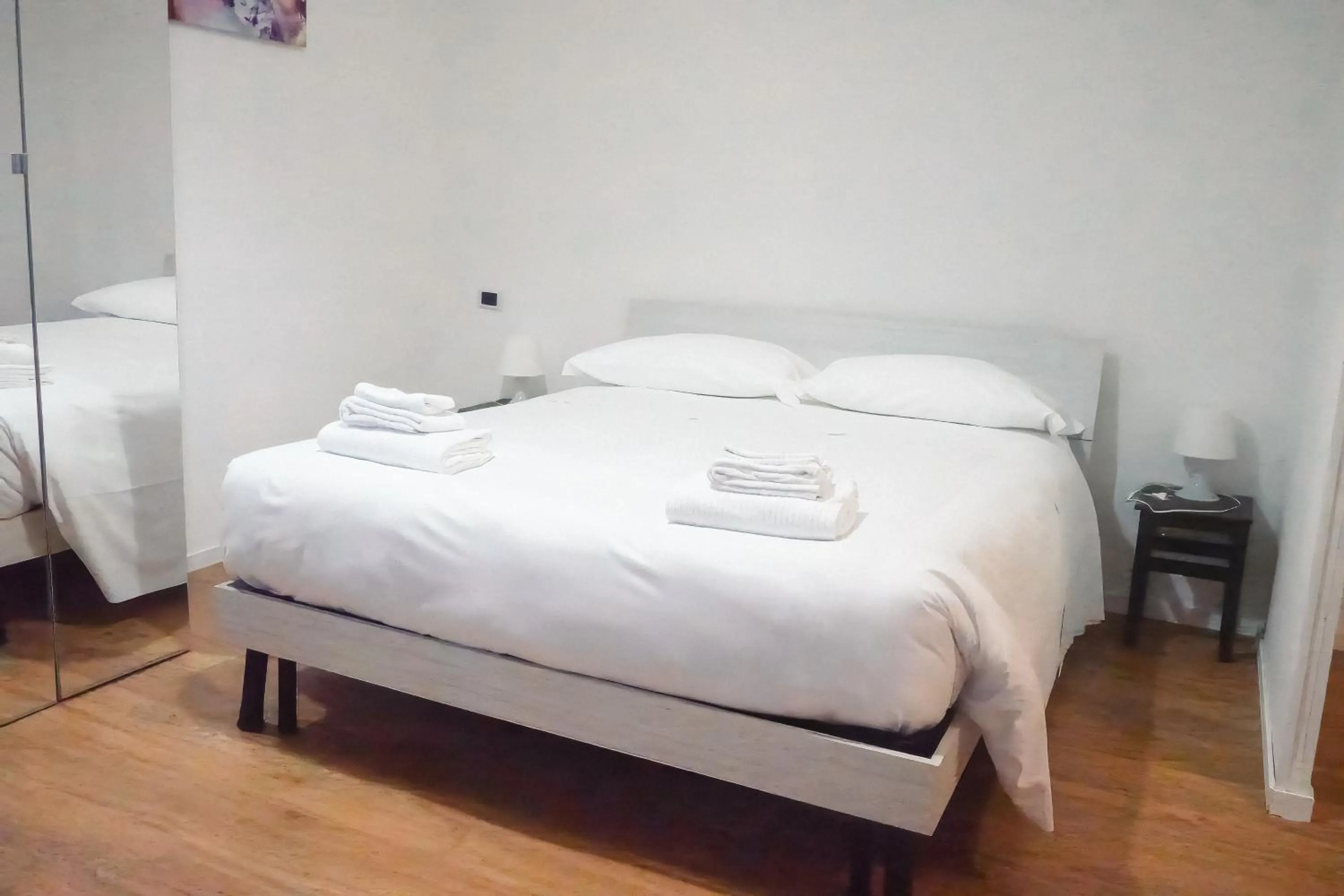 Bed in La Boheme SMART Hotel