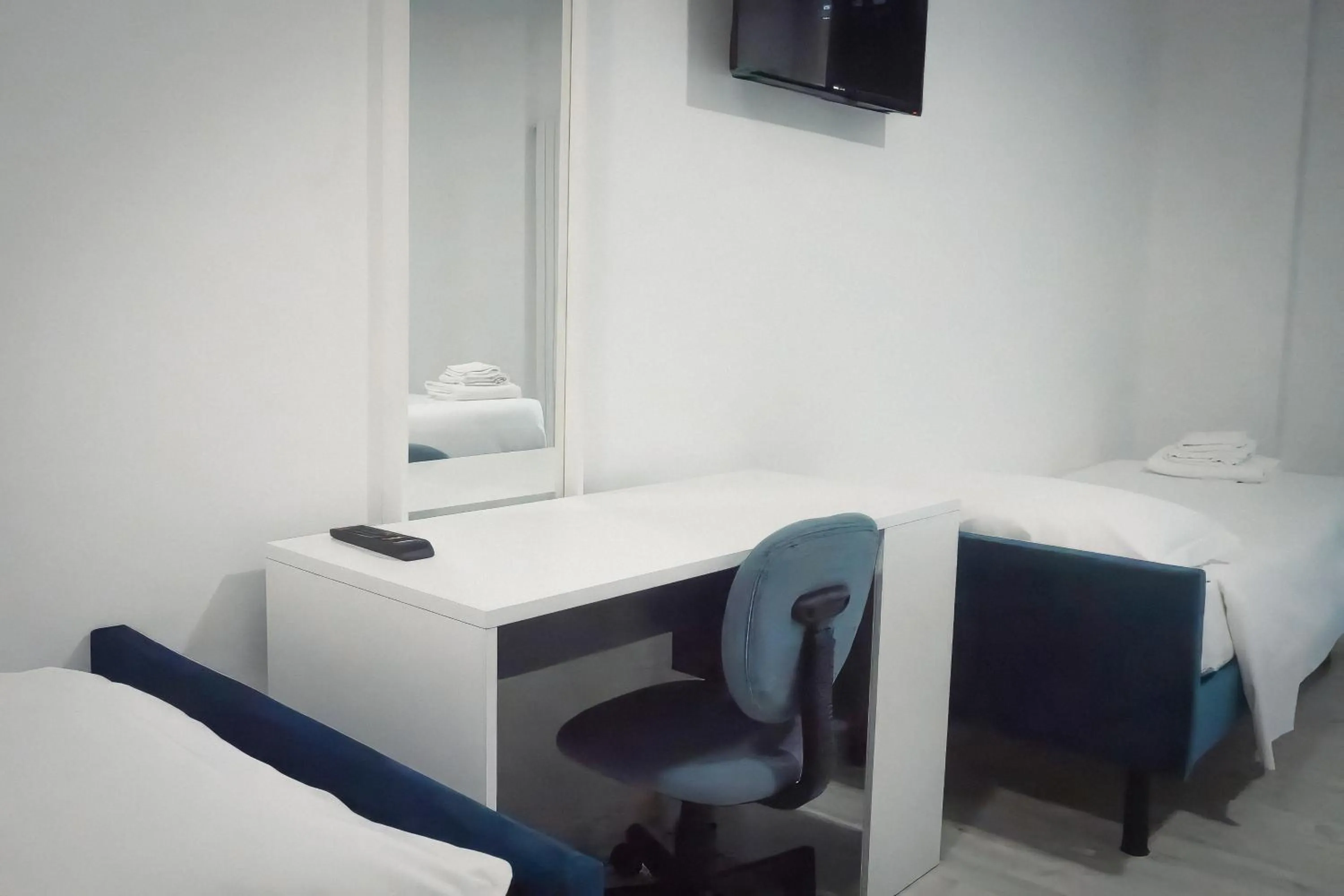 Bed in La Boheme SMART Hotel