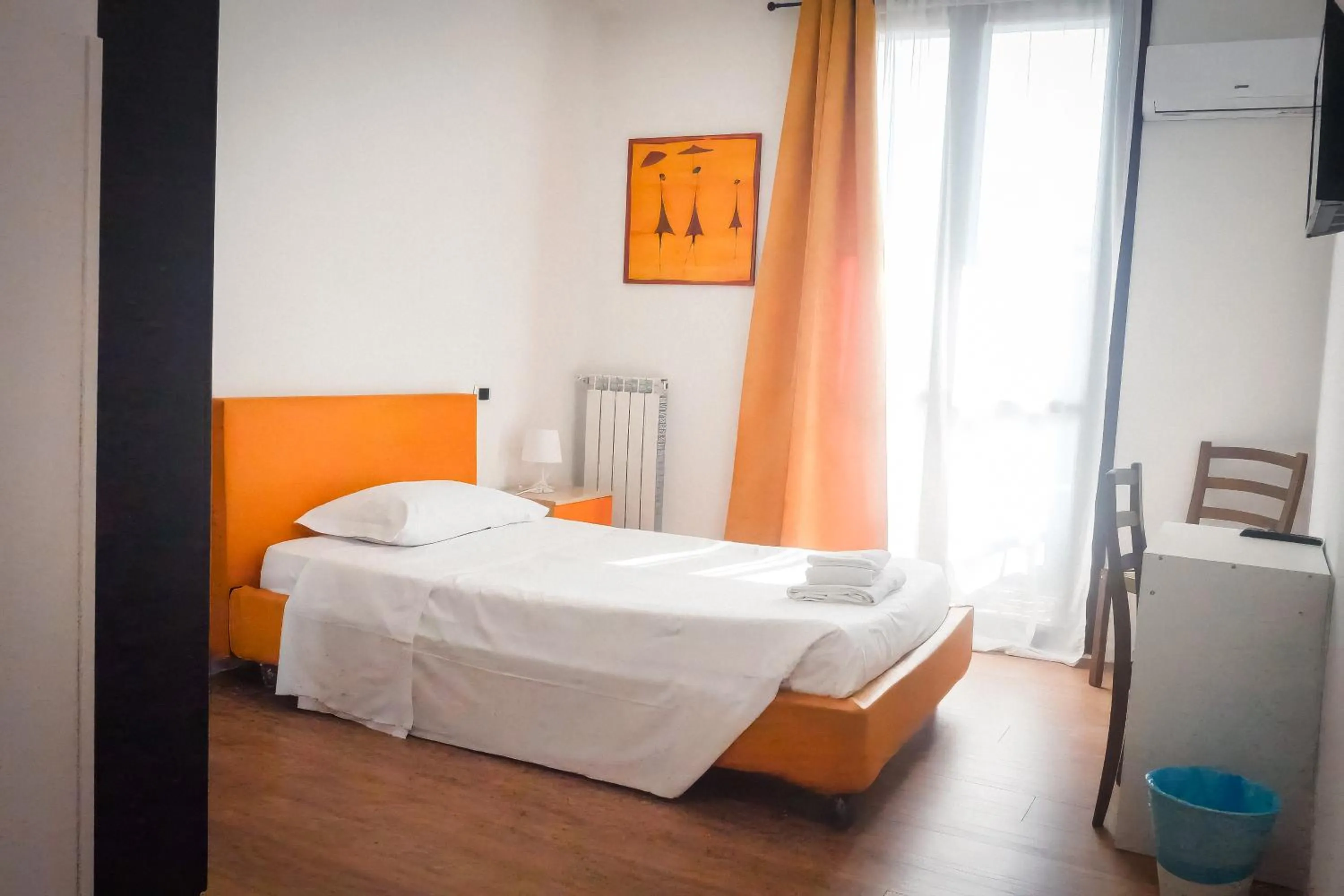 Bed in La Boheme SMART Hotel