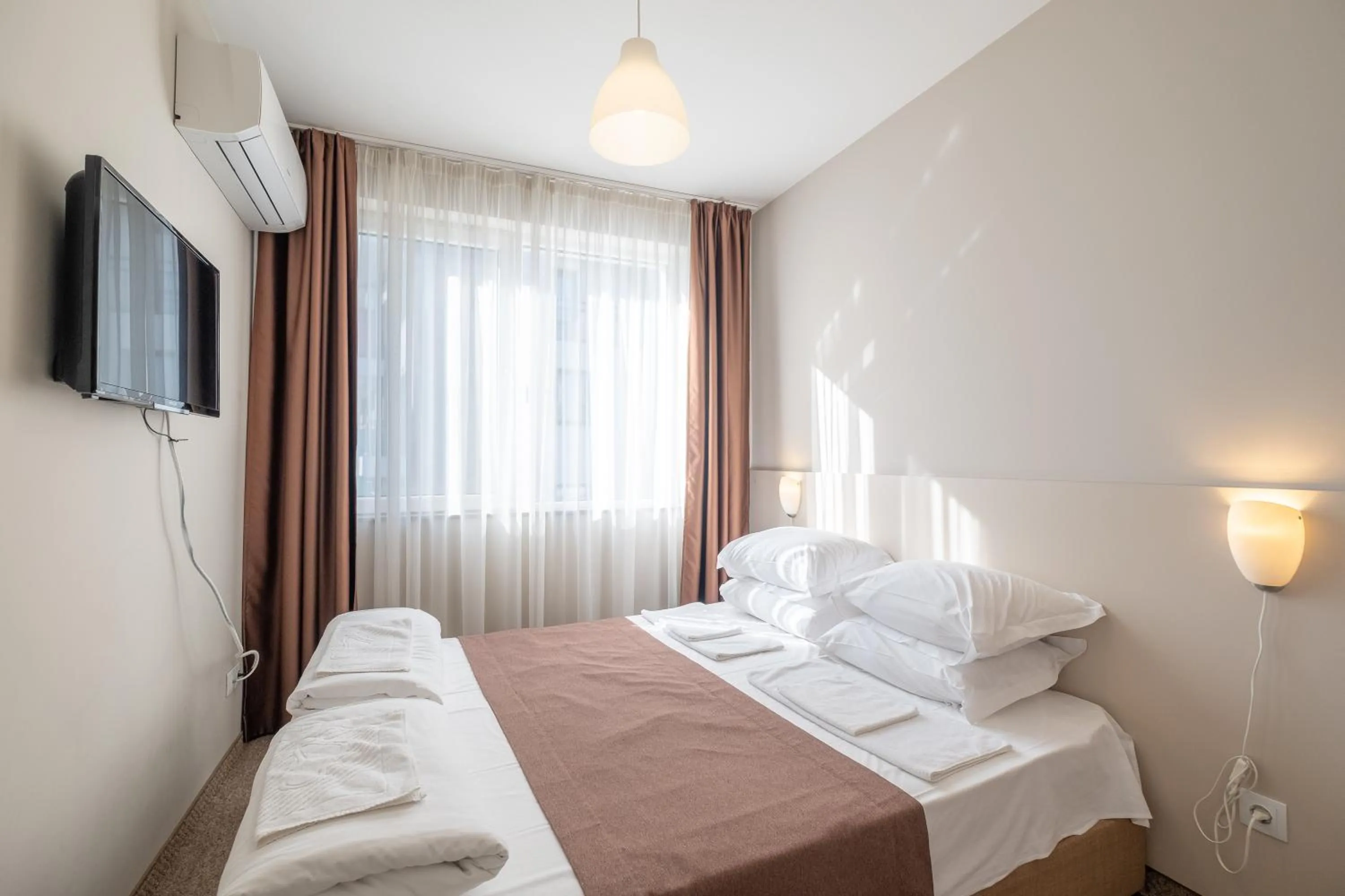 Photo of the whole room, Bed in Blue Label Apart House